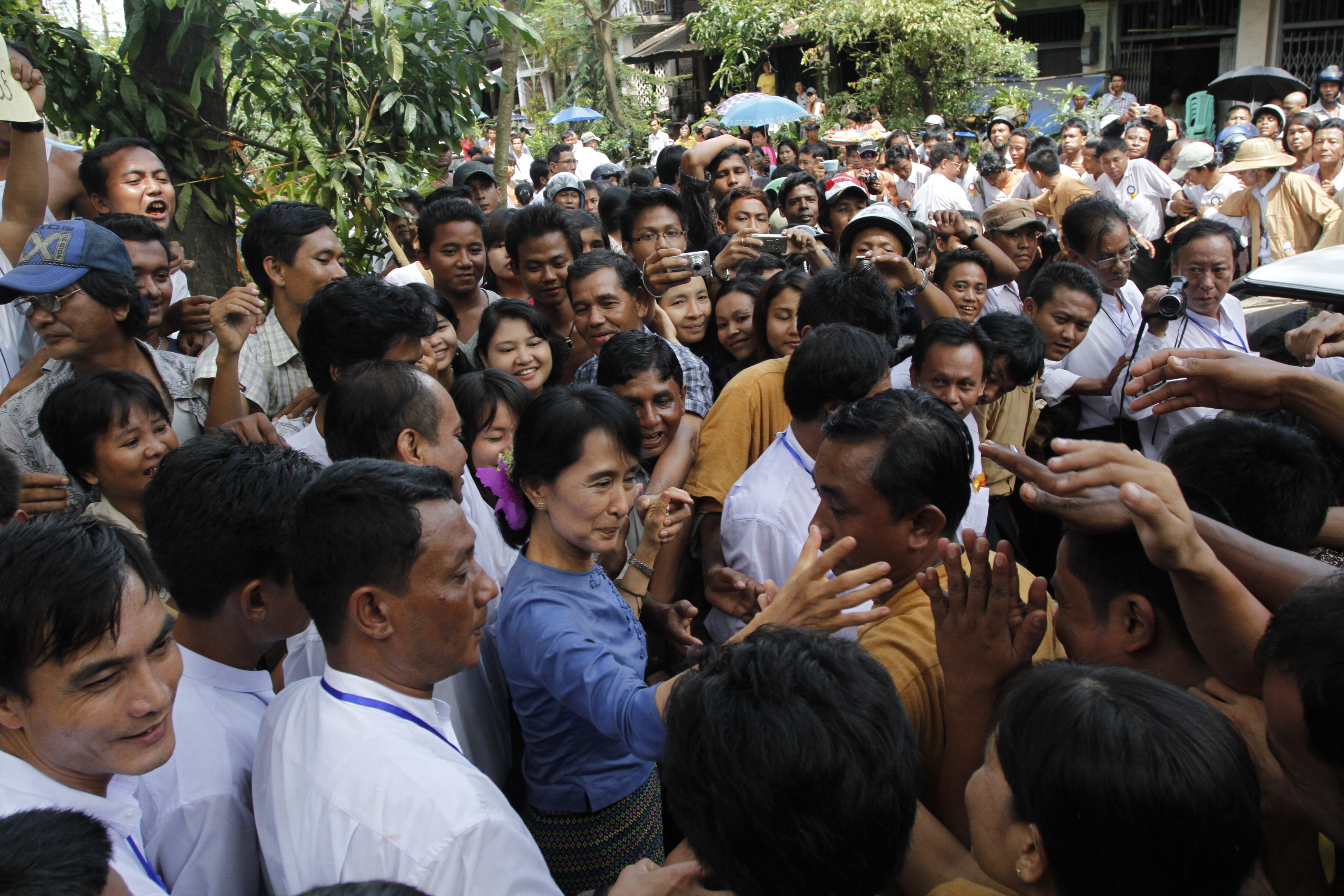 Aung San Suu Kyi greeting supporters from Bago Region on 14 August 2011.