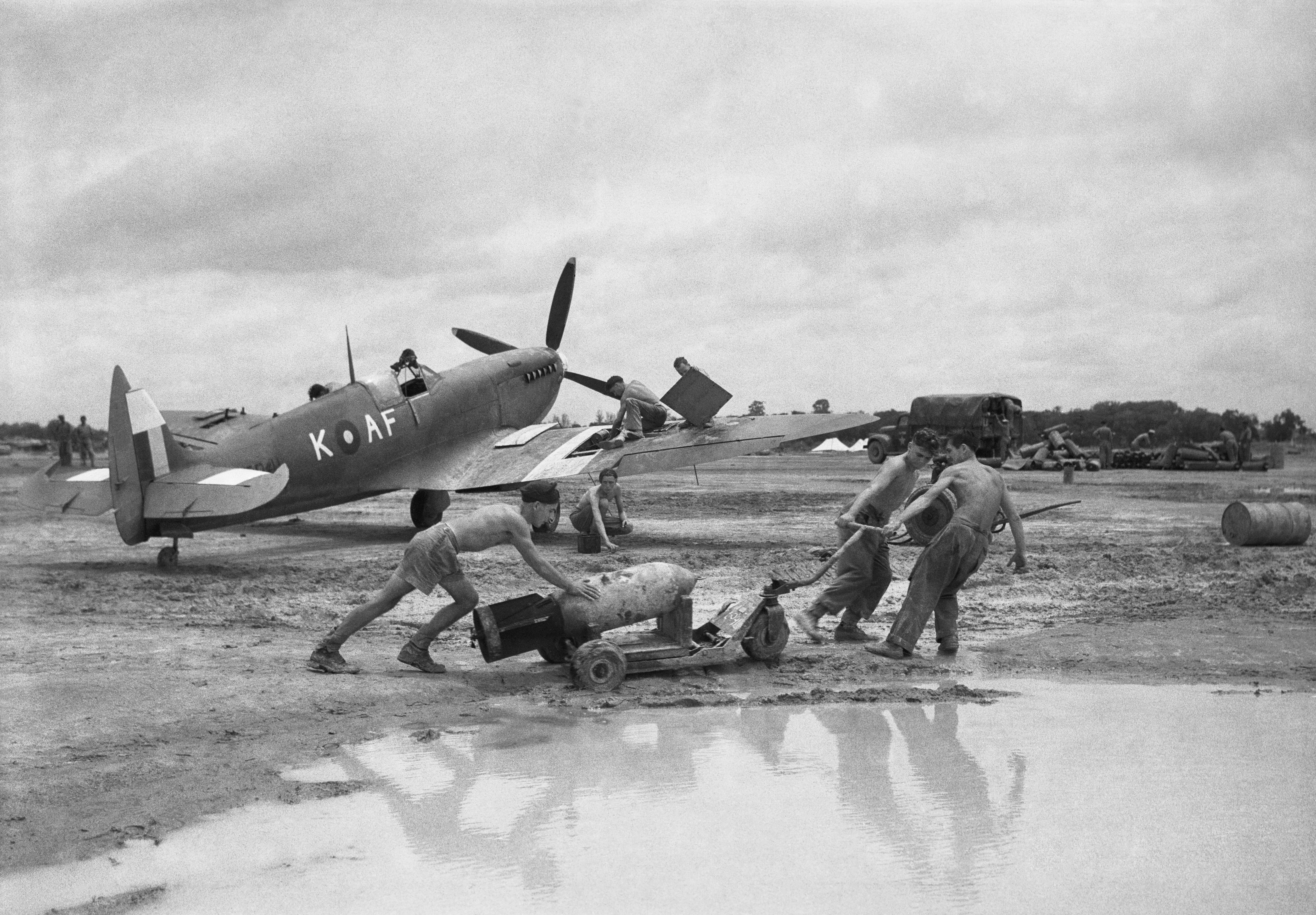 The War in the Far East- the Burma Campaign 1941-1945
Royal Air Force Operations: Airmen prepare a Supermarine Spitfire Mark VIII of No 607 Squadron for a sortie during moonsoon conditions at Mingaladon, Burma.