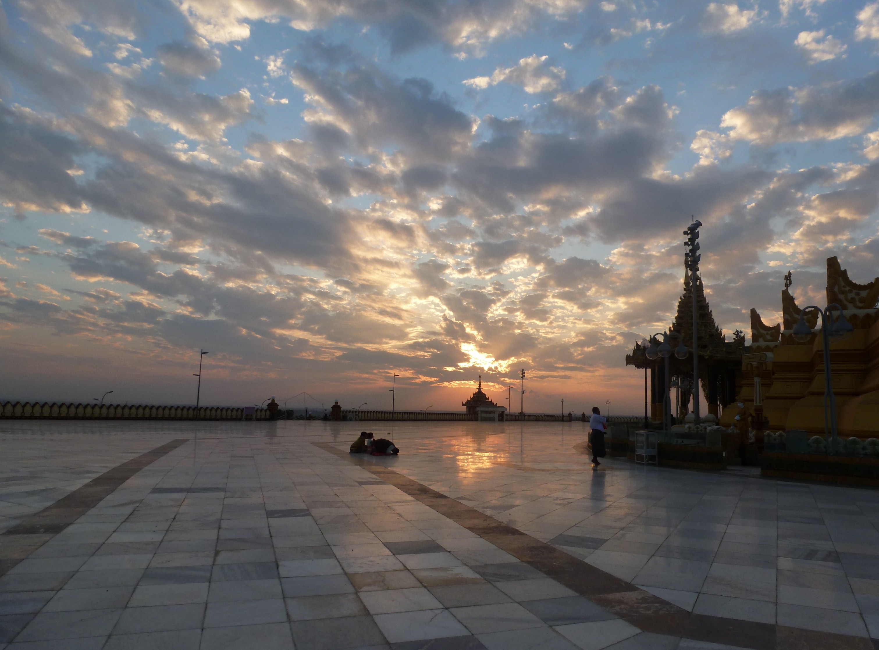 The plaza of the Uppatasanti Pagoda at sunset