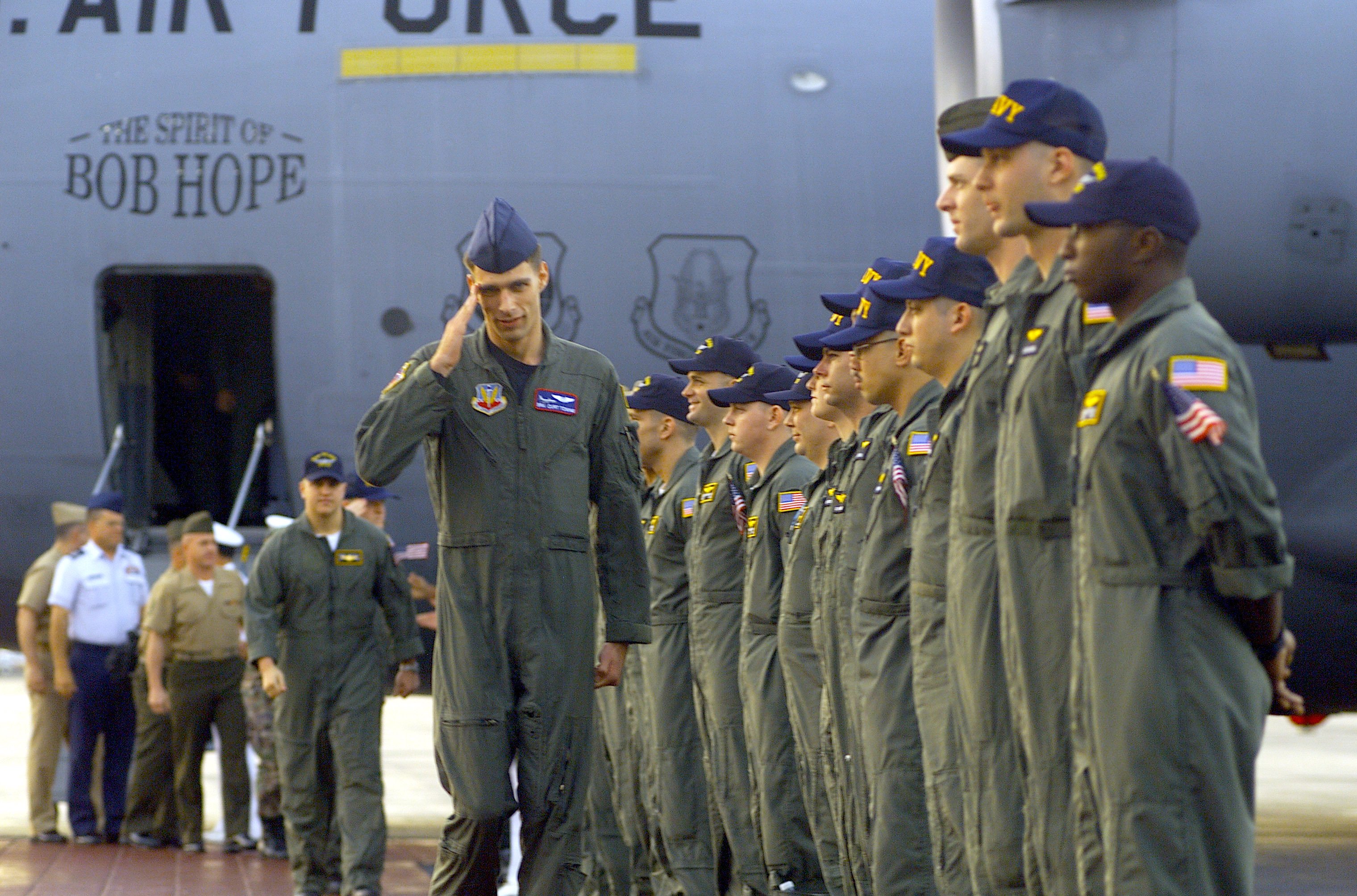 Air Force Senior Airman Curtis Towne salutes as he returns home from Hainan on April 12, 2001.  He was a crewmember on the U.S. Navy EP-3 aircraft that was involved in an accident with a Chinese F-8 aircraft on April 1, 2001.