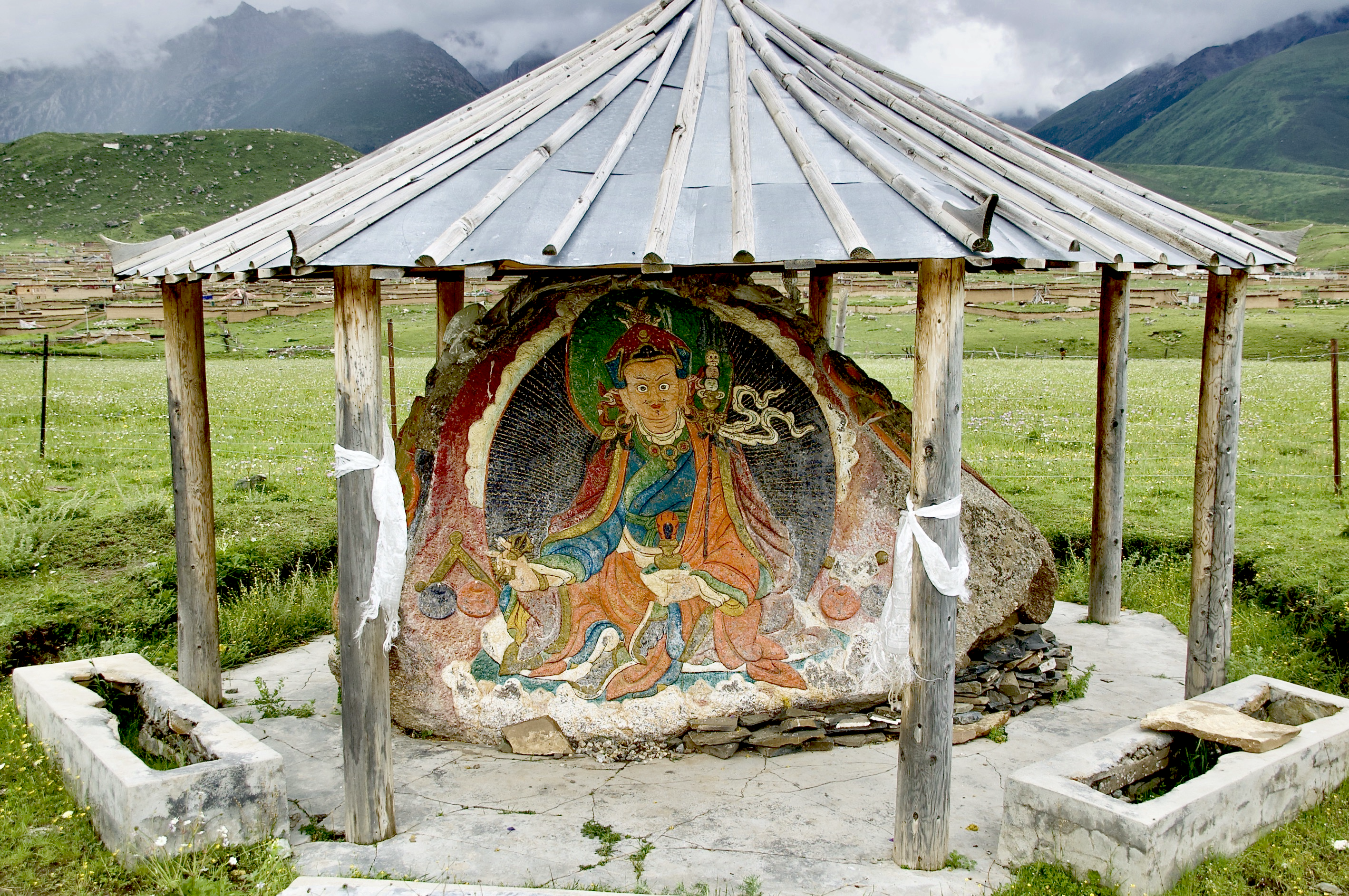 Image of Guru Rinpoche welcoming pilgrims and visitors on the road to Dzogchen Monastery, Sichuan, 2009