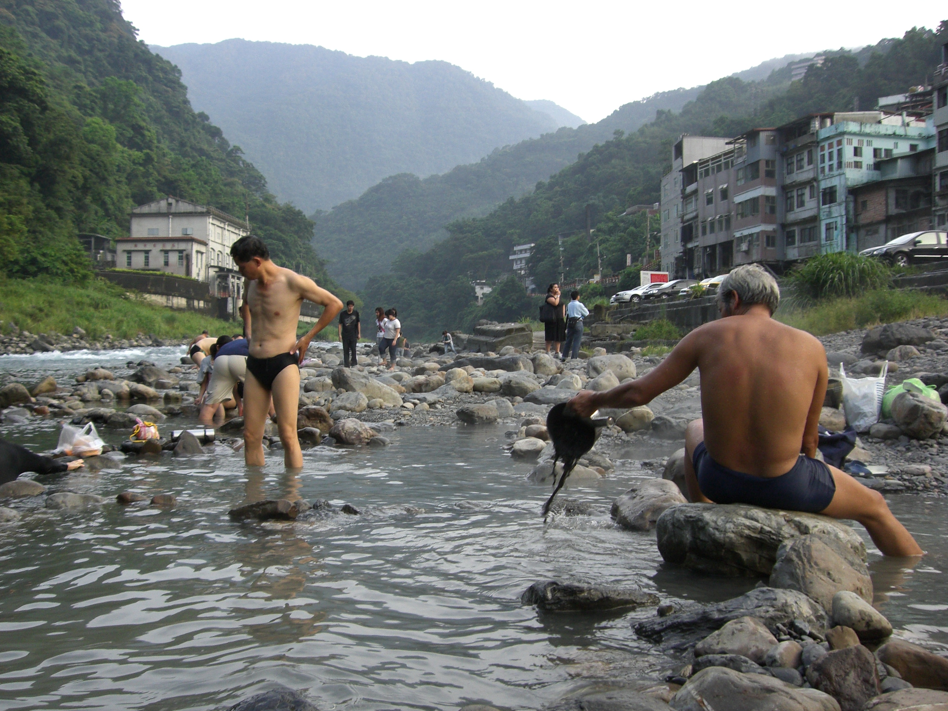 The free hot spring on the banks of the river.  Make your own rock pool!