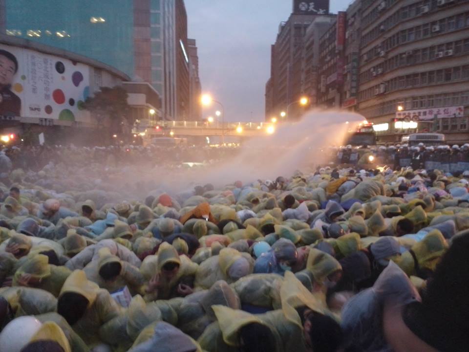 Anti-nuclear protesters sprayed by water cannons in Taipei, Taiwan on April 28, 2014
