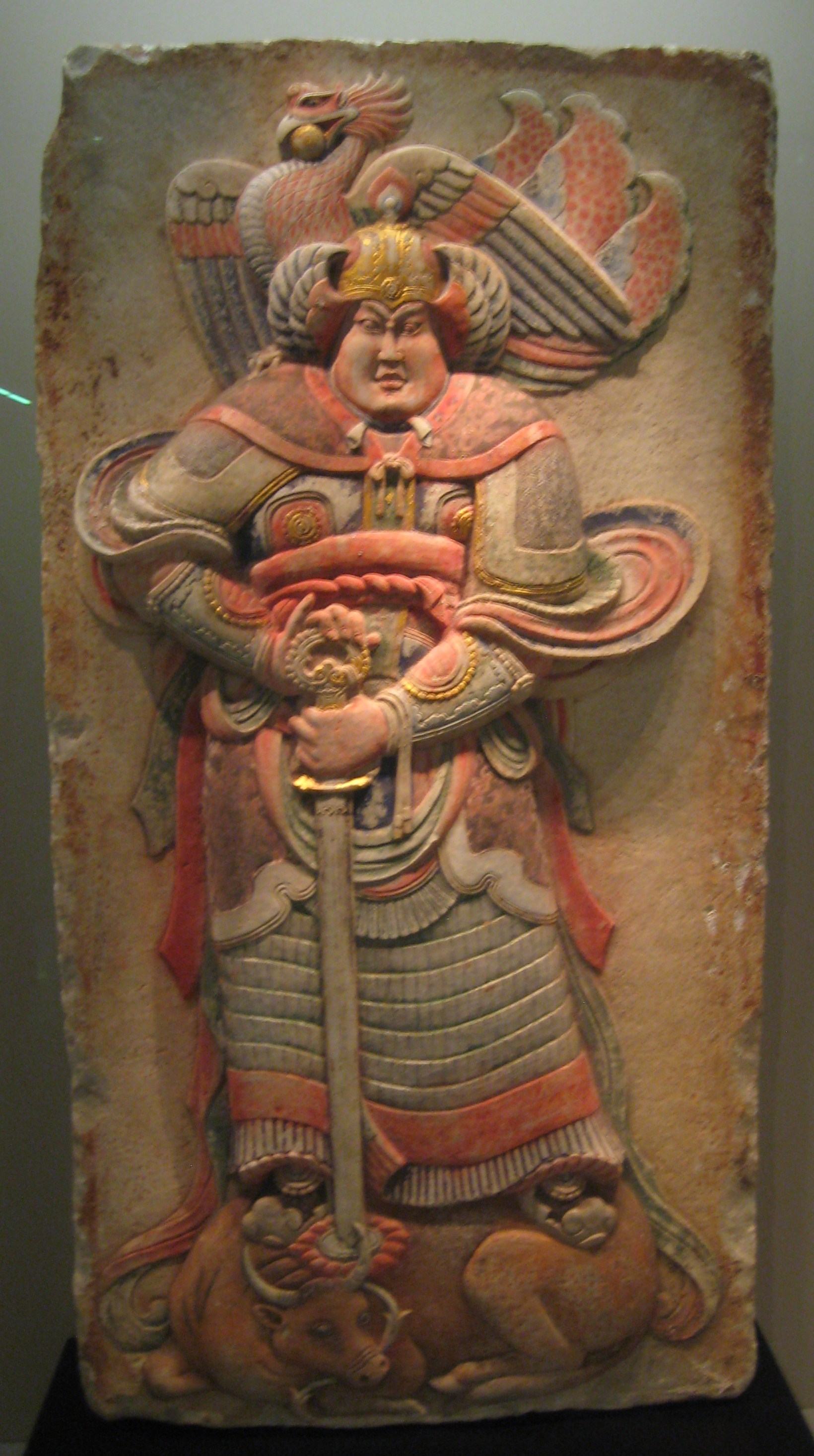 Painted stone relief depicting a warrior from the Later Liang Dynasty. Unearthed from the tomb of Wang Chuzhi 王處直 at Quyang, Hebei Province, 1995.