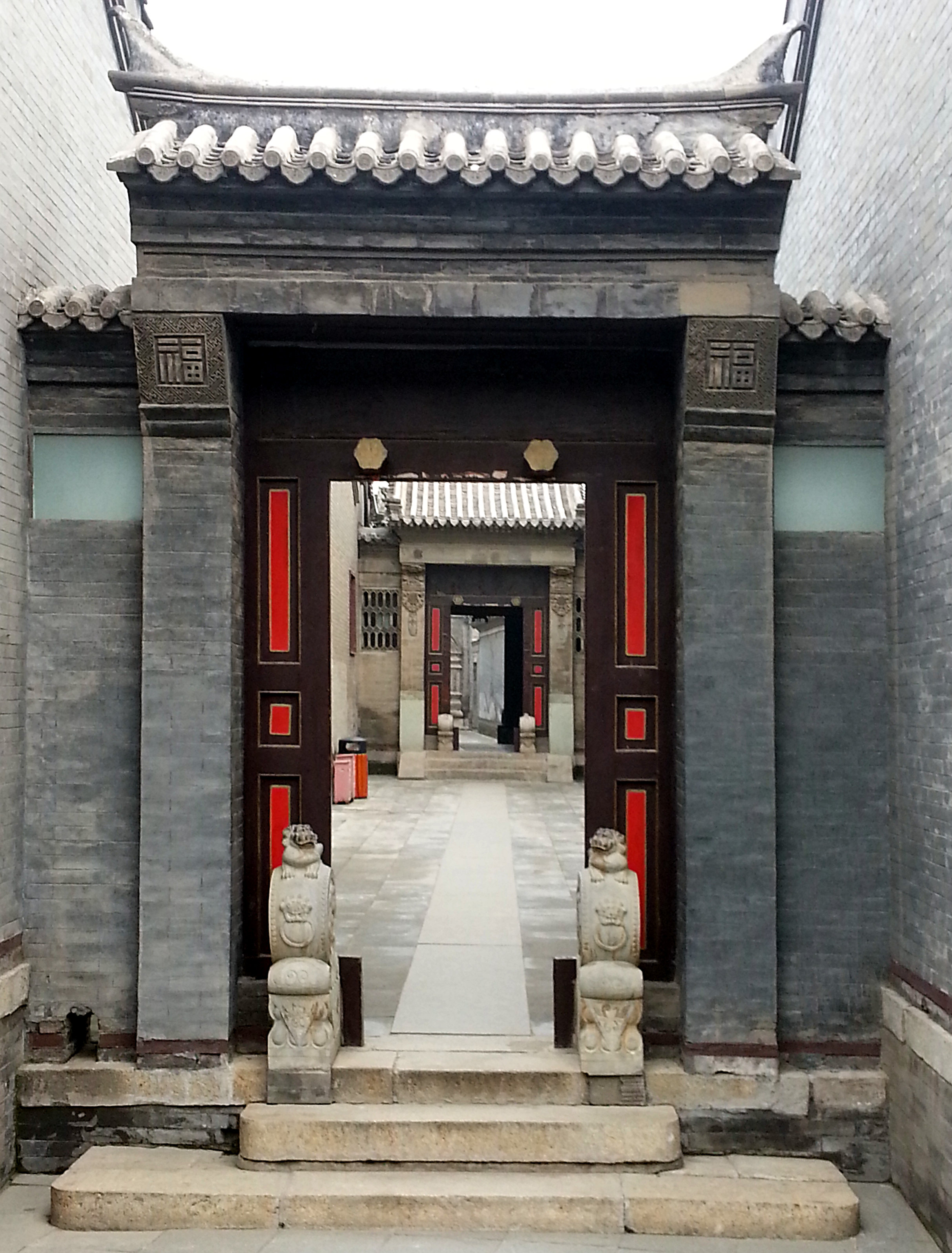 Photograph of doorways in the Shi Family Grand Courtyard, Tianjin, China.