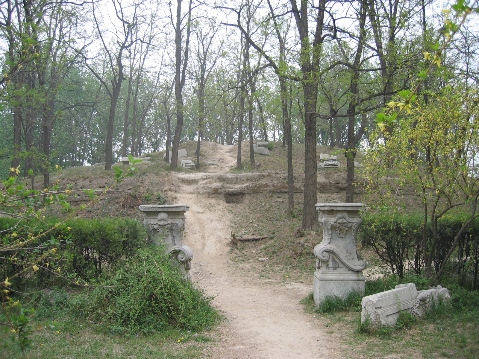 The Xian Fa Shan, a circular mount in the Xiyang Lou (Western mansions) section.
The pavilion which once stood on top of the hill is completely destroyed but for some scattered mansonry and the outline of the foundations.
On the grounds of the Yunamingyuan (Old Summer Palace) — in Beijing.
