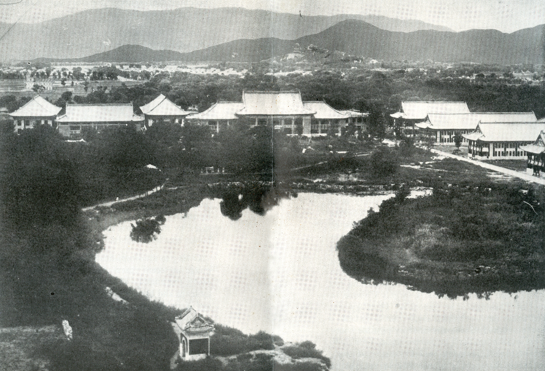 Campus of Yenching University with the Western Hills and the pagoda on the Summer Palace grounds seen in the distance. Scan from "Our University in Peking" 1926
