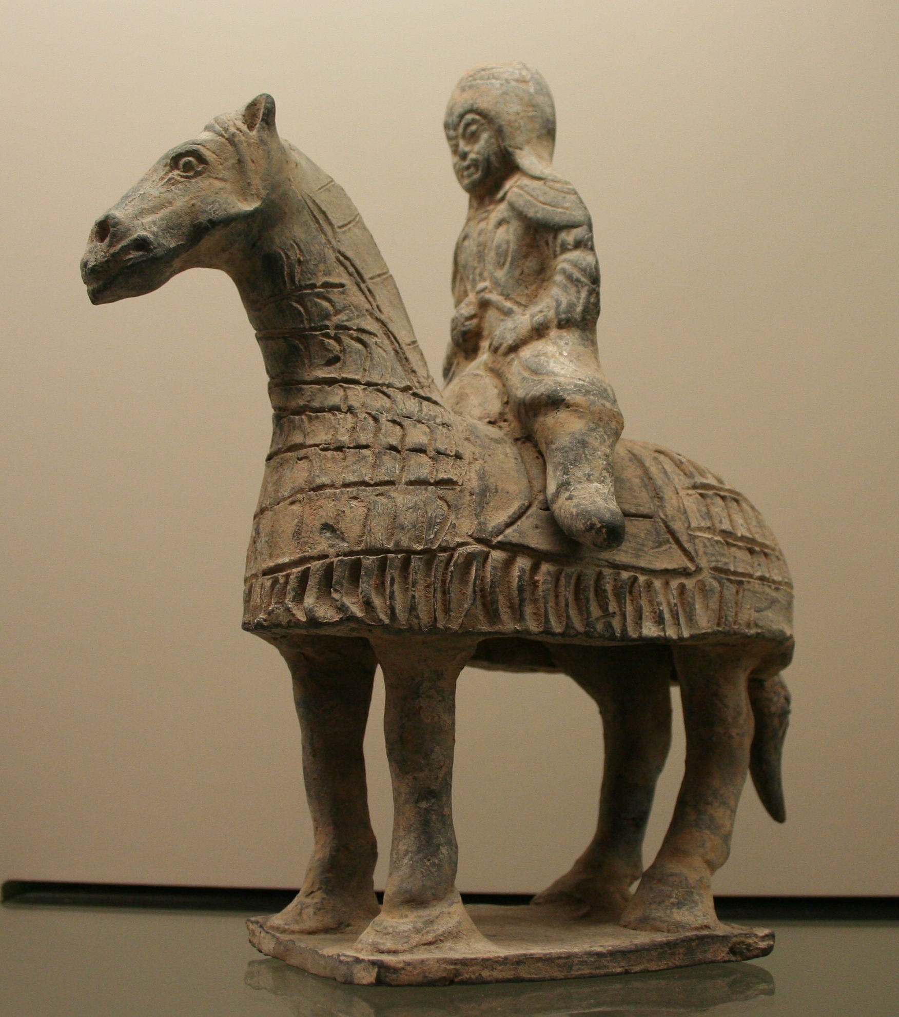 Warrior on a Caparisoned Horse (Jiaqi Juzhuang Yong). Terra Cotta. Nothern Wei Dynasty (386 – 534). Cernuschi Museum, Paris, France.
