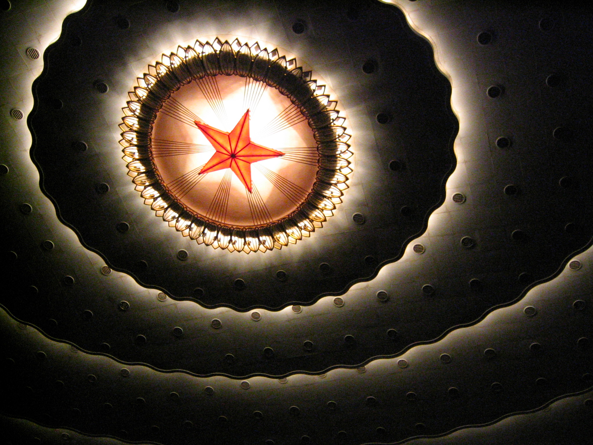 The ceiling of the 10,000-seat auditorium in China's Great Hall of the People.