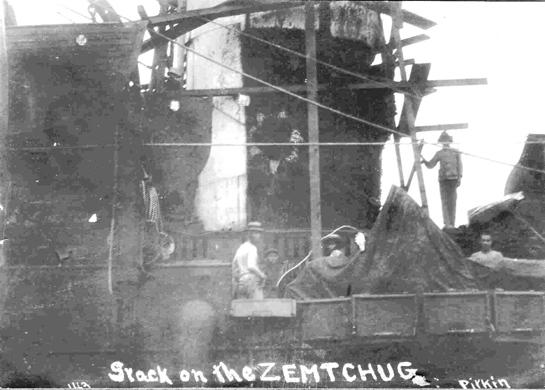 Battle damage to stack of Russian Armoured cruiser Zemtchug after battle of Tuschima strait.  Digitally-enhanced from sephia-tone original taken in June 1905 in Manila bay,  where Zemtchug and its sister-ships Aurora and Oleg were interned after the battle.