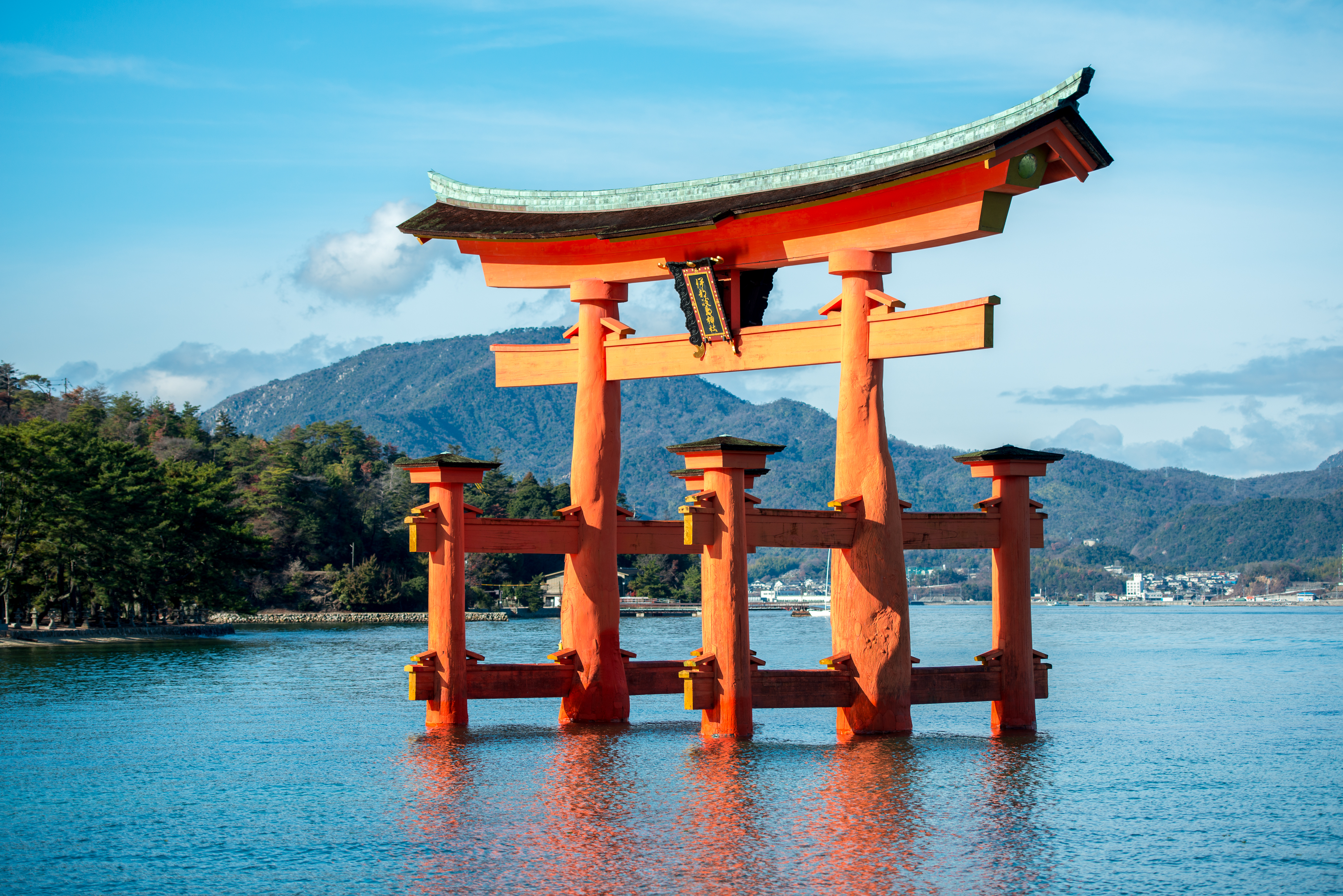 The torii gate at Itsukushima Shrine on the island of Itsukushima (popularly known as Miyajima) in Hiroshima Prefecture, Japan