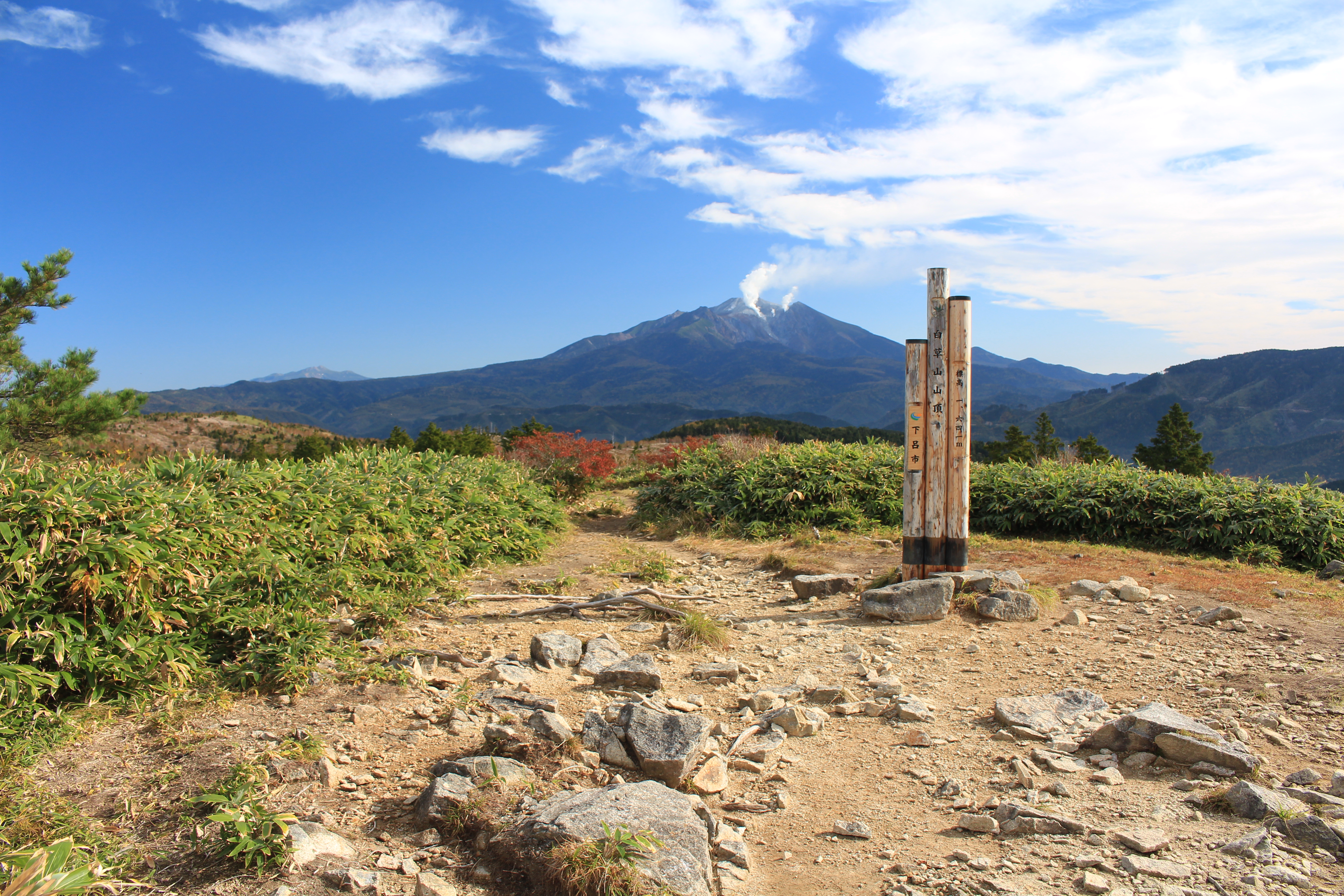 Mount Ontake seen from peak of Mount Shirakusa, in Ōtaki, Nagano prefecture and Gero, Gifu prefecture, Japan.