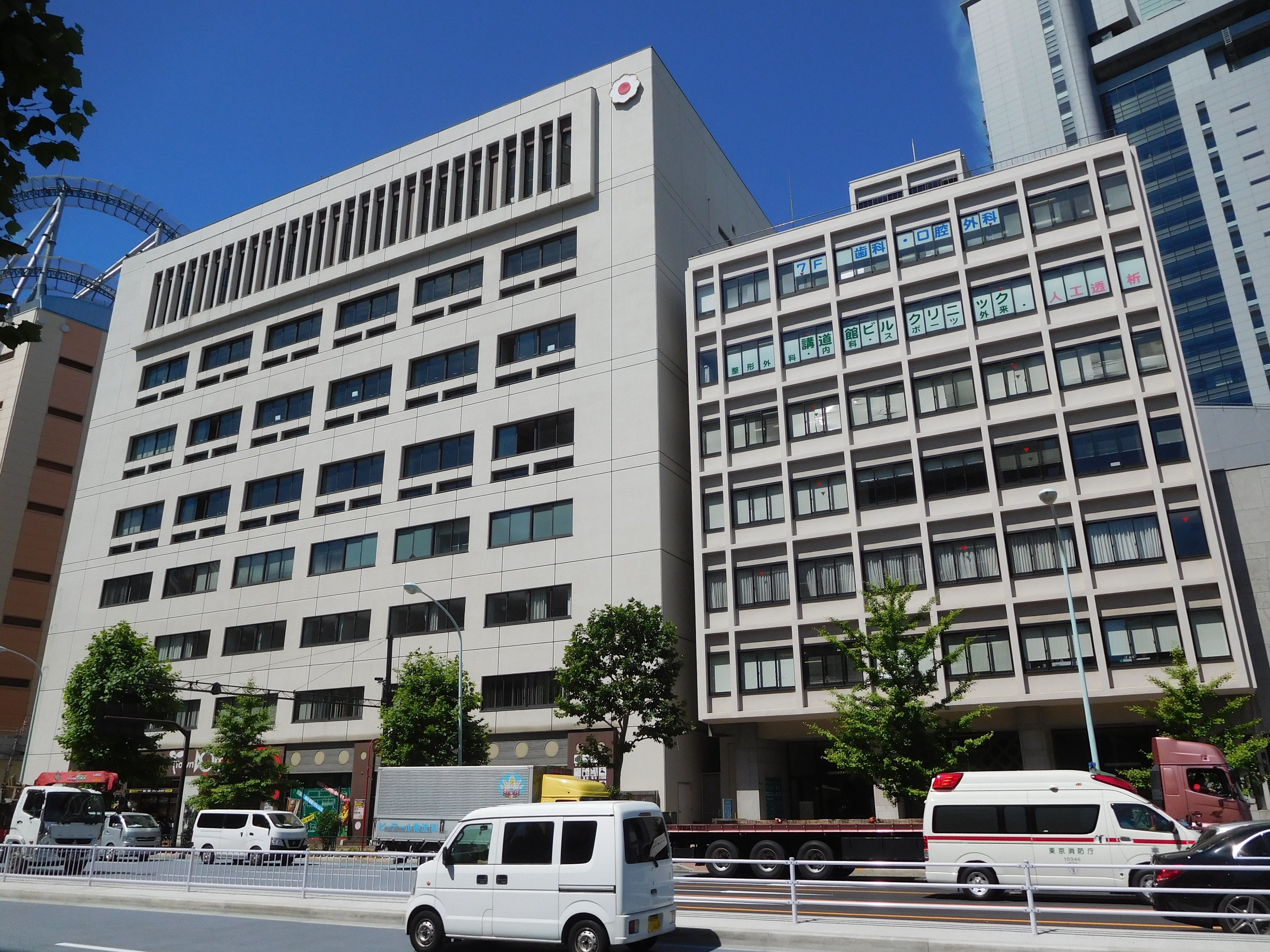 These buildings are Kodokan Judo Institute in Bunkyo, Tokyo, Japan. Right side building is Main of Kodokan, Left side building is Kodokan International Judo Center (new building).