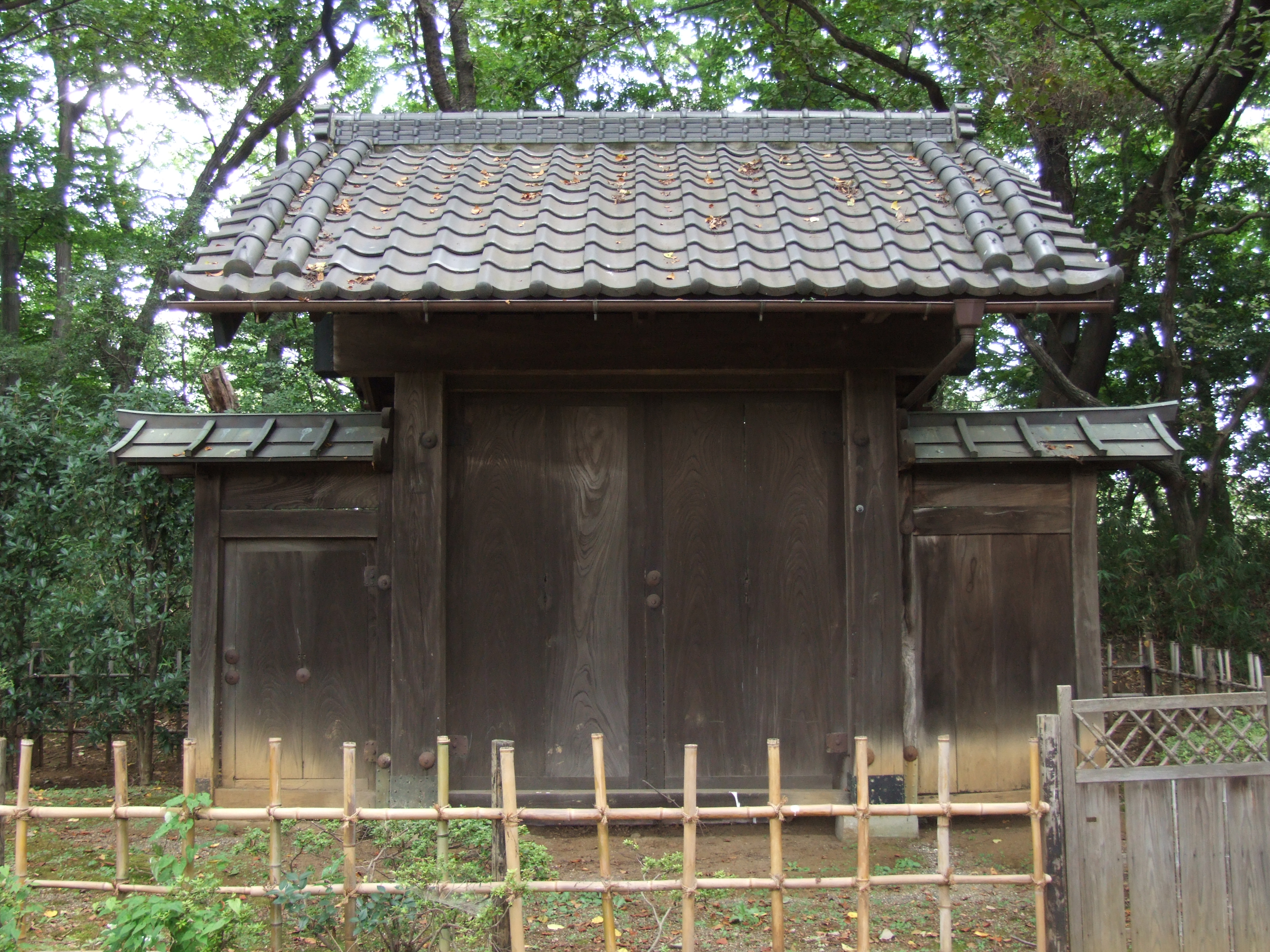 A rear gate of Iwatsuki Castle. Iwatsuki ward, Saitama, Saitama prefecture, Japan. It had been used for a private house since the abolition of Iwatsuki Castle. The owner Arikawa gave it to Iwatsuki City in 1980. It was build in 1770 and has been said a rear gate. But unknown what office's rear.