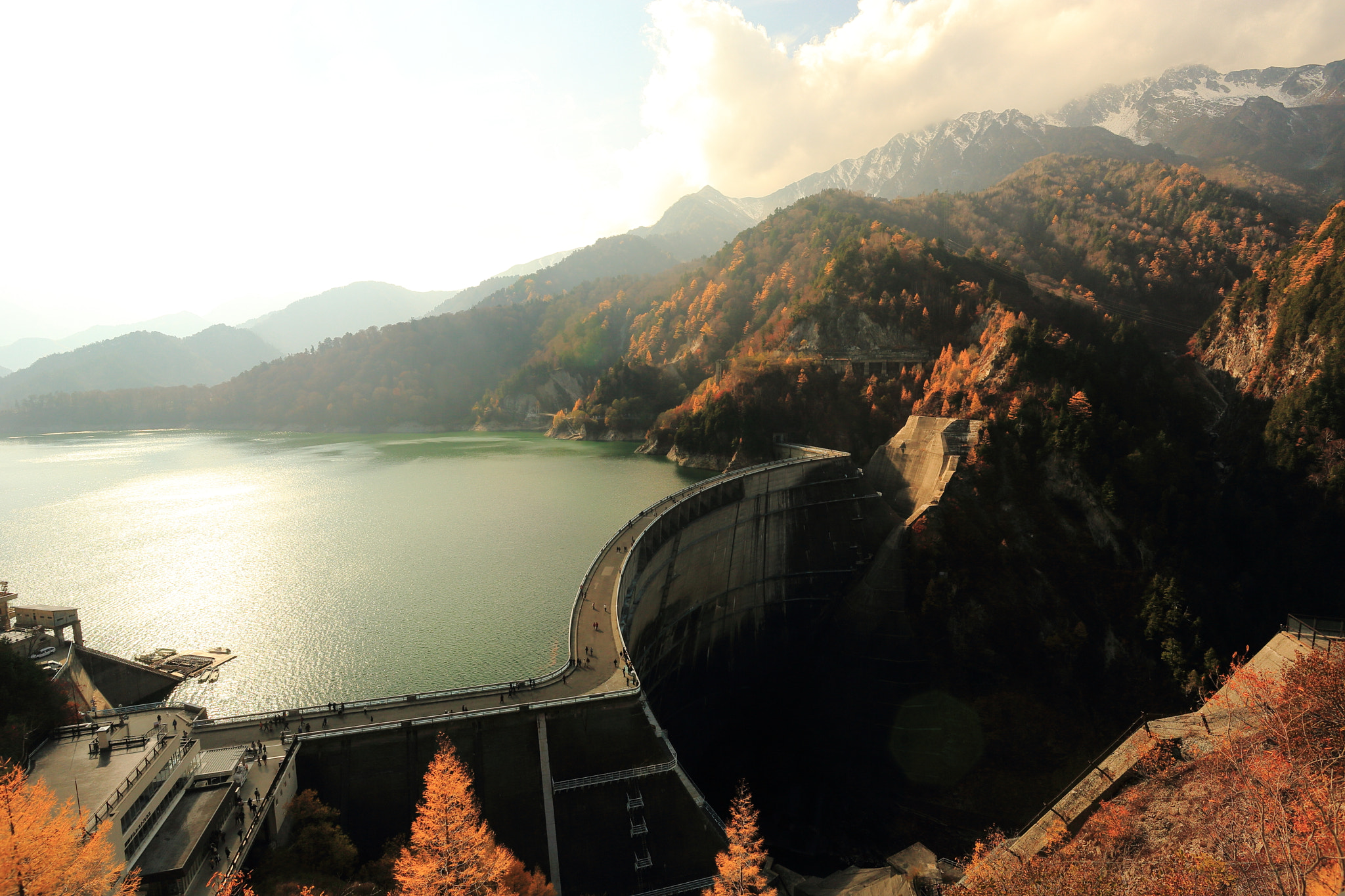 500px provided description: This is the Kurobe Dam. It is the largest dam in Japan. I am standing on very steep place.
I have published here a lot of photos.

mandegan.jp/?gallery=kurobe-aki [#lake ,#japan ,#fall ,#kurobe ,#Japan ,#Dam]