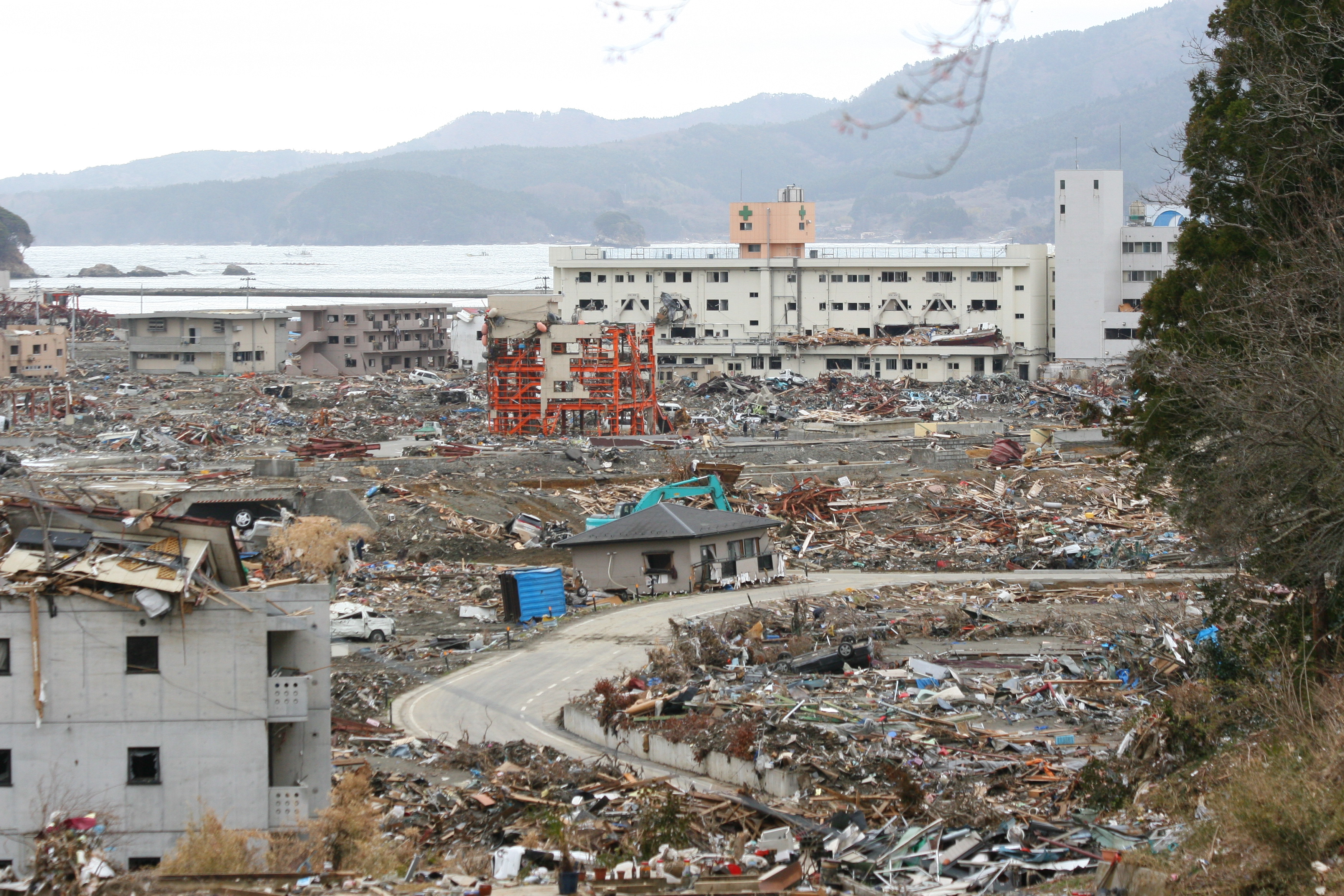 Minamisanriku, Miyagi, Japan, a month after the 2011 East Japan Great Earthquake. The Shizugawa Public Hospital (the white building) can be seen in the background