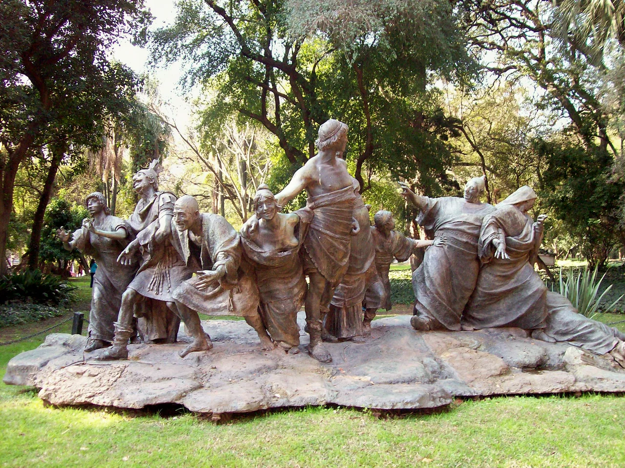 Saturnalia, sculptor w:en:Ernesto Biondi, 1899. A bronze copy of 1909, the Botanical Garden of w:en:Buenos Aires. Original in w:en:Galleria Nazionale d'Arte Moderna in w:en:Rome. The original was shown in the Exposition Universelle (1900) in Paris (Charles Ponsonailhe: La Sculpture étrangère à la décennale in L'Exposition de Paris, 1900, Paris, Montgrédien Ed., S. 259)