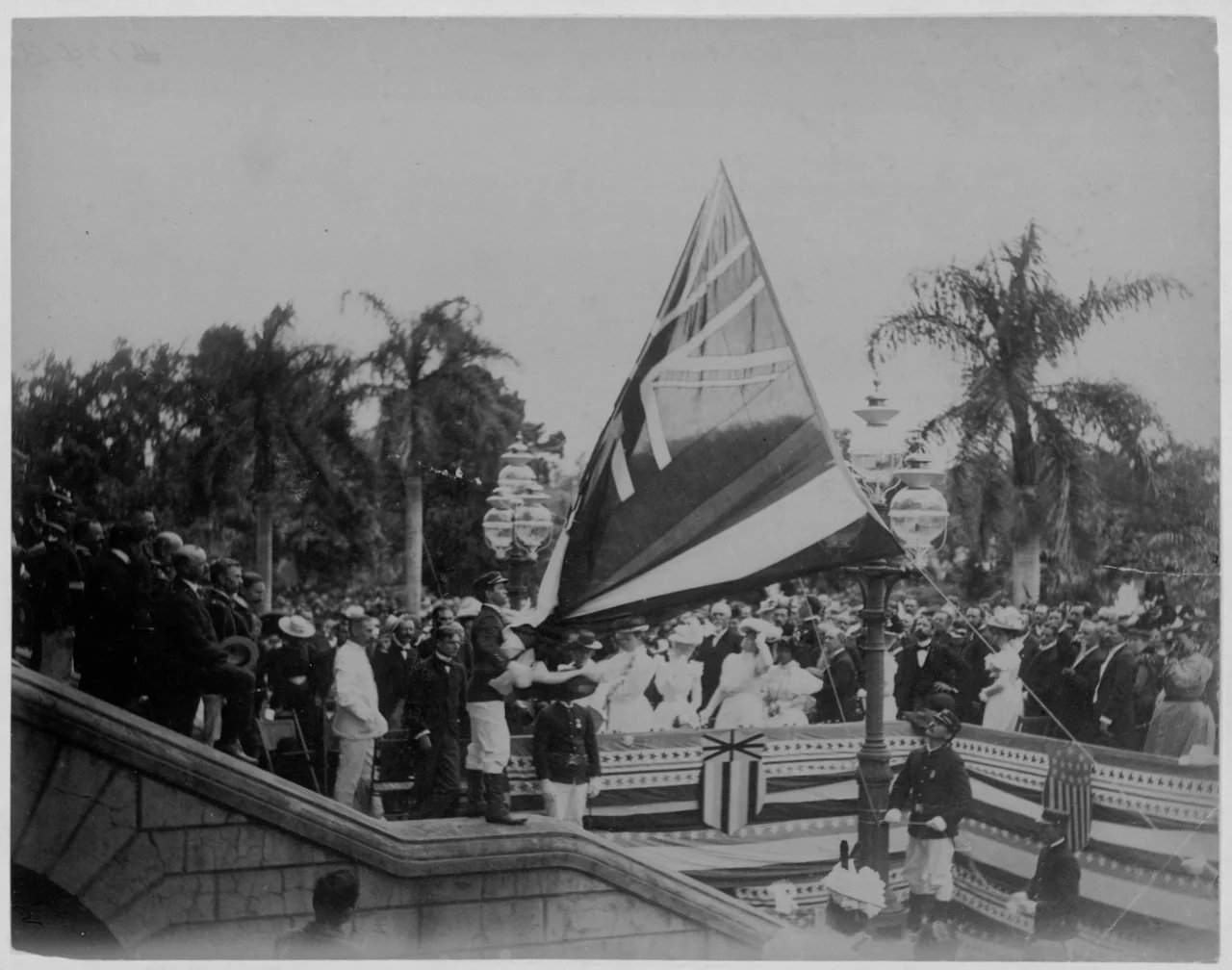 On August 12, 1898, the flag of the Kingdom of Hawaiʻi over ʻIolani Palace was lowered to raise the United States flag to signify annexation.