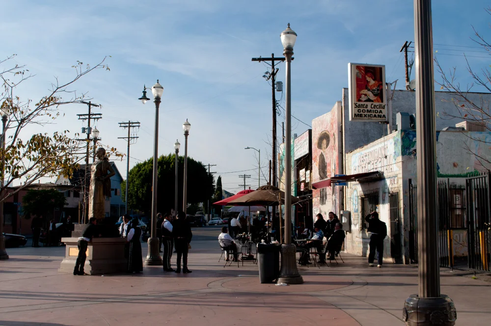 Boyle Heights, where the Mexican influence of East Los Angeles continues to predominate, though there is a bit of Japanese presence from Little Tokyo across the Los Angeles River. Two underground Metro Gold Line stations, Soto and Mariachi Plaza, serve the neighborhood.
Here at Mariachi Plaza, it's all Mexican. In fact, there are several mariachi bands from Michoacan, Mexico, who are available for hire, as seen here.
The statue commemorates Lucha Reyes (1906-1944), a Mexican singer who was best known for singing the Ranchera Song.