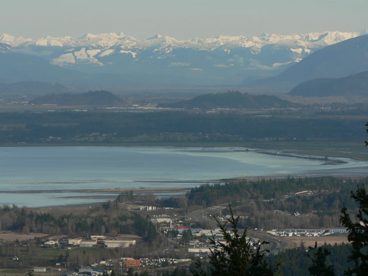 Padilla Bay and March Point (foreground); Skagit River Valley and North Cascade Range (beyond)