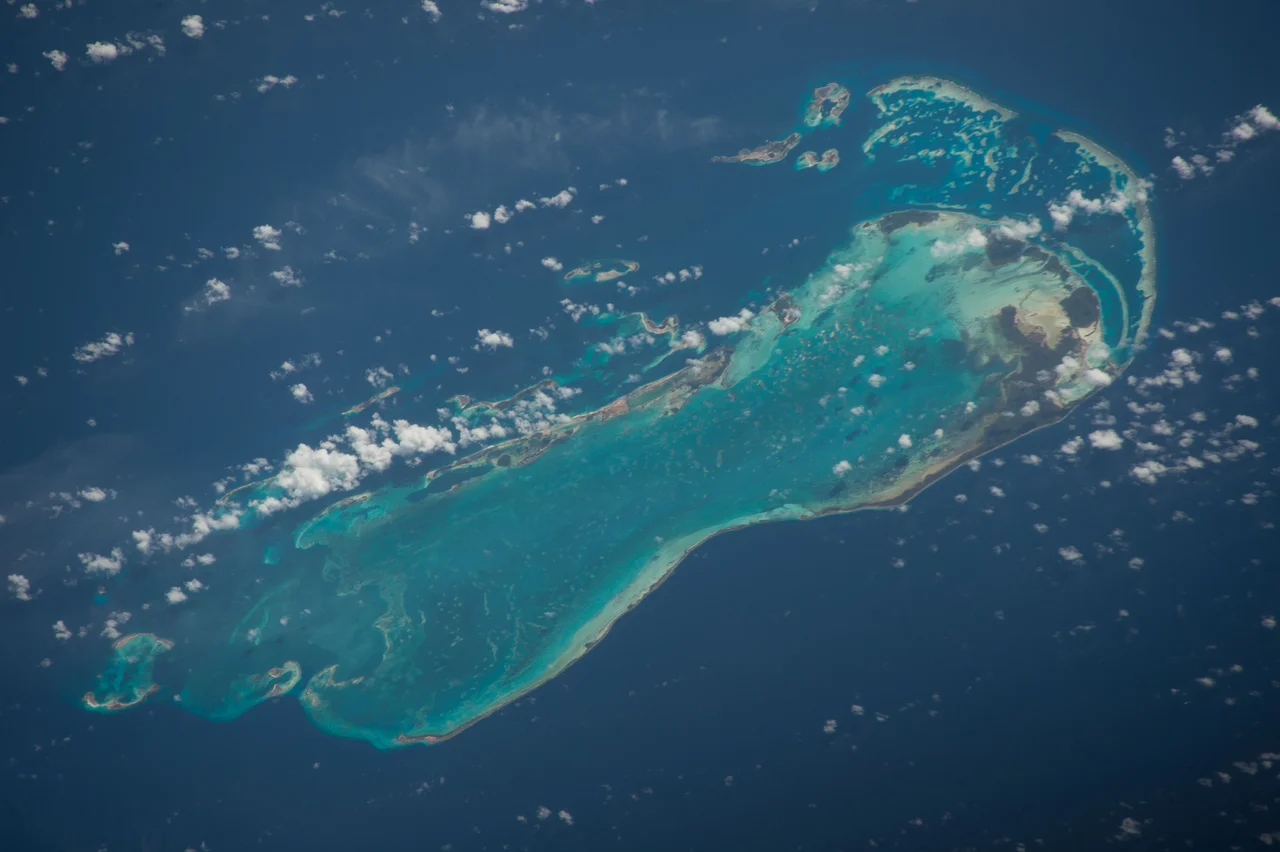 Aerial view of the Gran Roque village, the largest settlement of the Los Roques archipelago (Venezuela). On the upper left corner of the image, El Faro Holandés (The Dutch Lighthouse, built between 1870 and 1880) is visible.