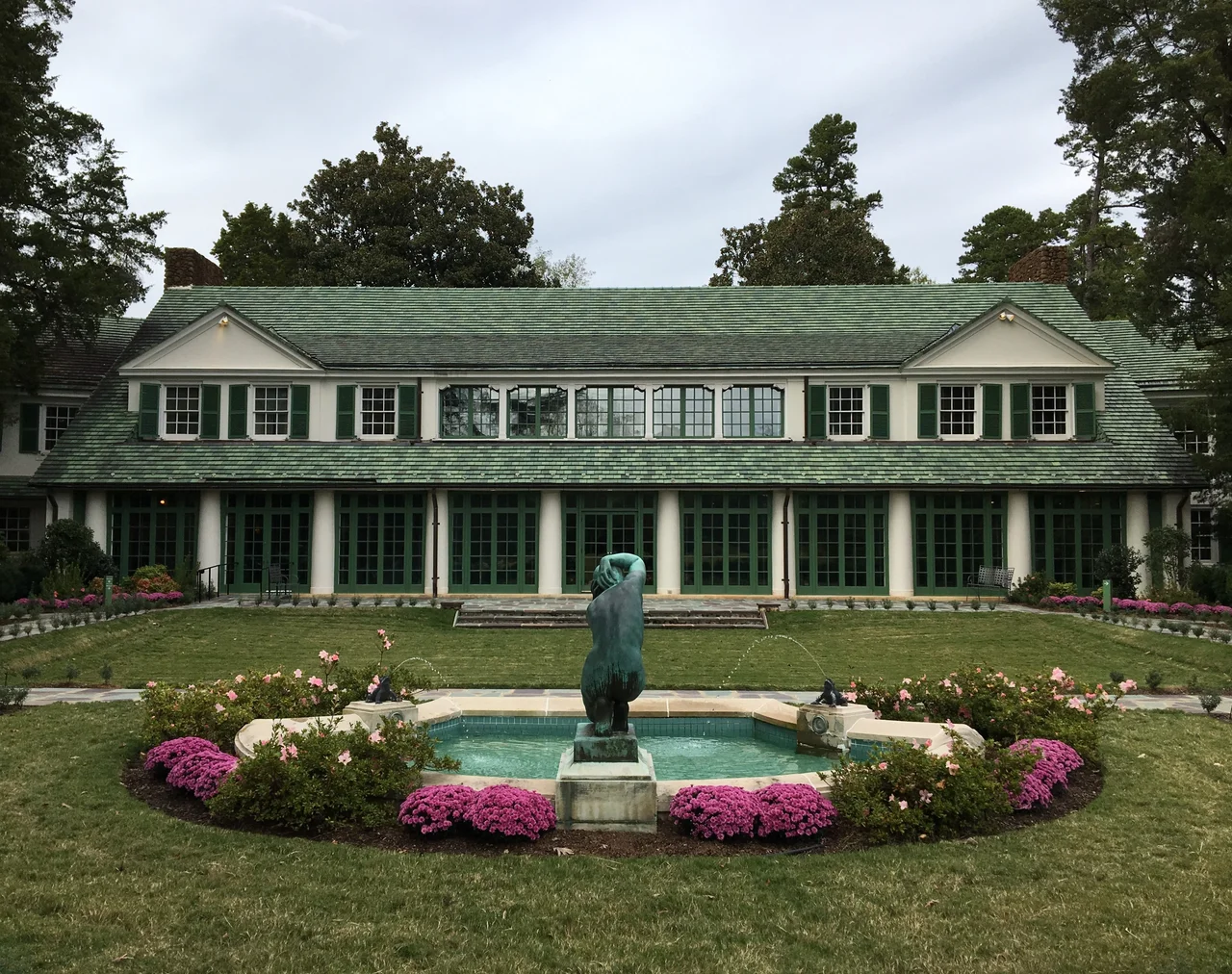 Front facade of Reynolda House Museum of American Art showing the recessed forecourt garden.