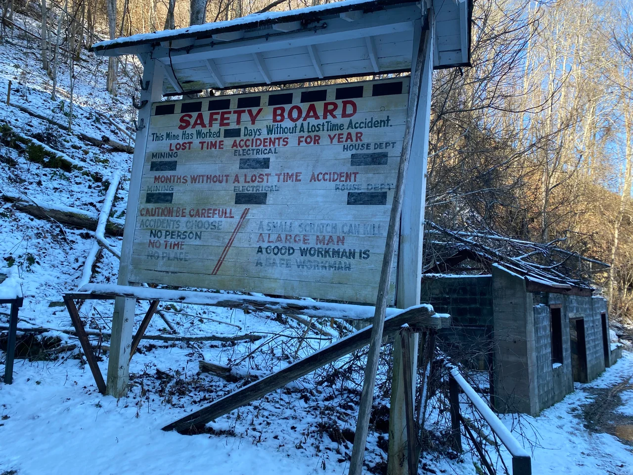 Photograph of historic signs outside of Kay Moor Coal mines taken in Winter 2022.
