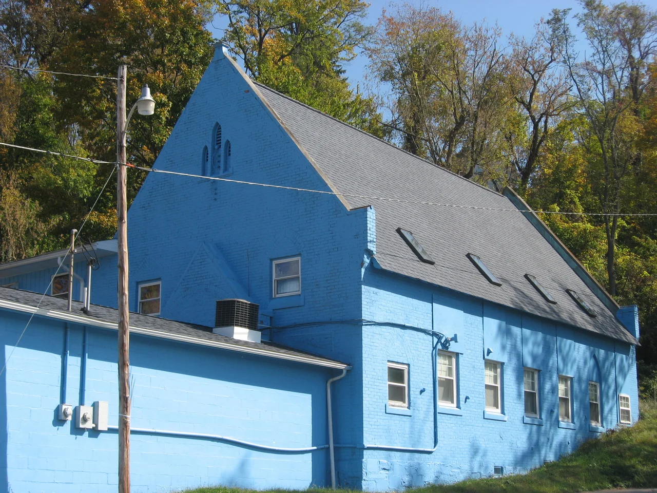 Front and southern side of the former St. John's Lutheran Church, located on the southern side of Avery Street between 9th and 9½th Streets in Parkersburg, West Virginia, United States.  Built in 1907, it is part of the Avery Street Historic District, a historic district that is listed on the National Register of Historic Places.