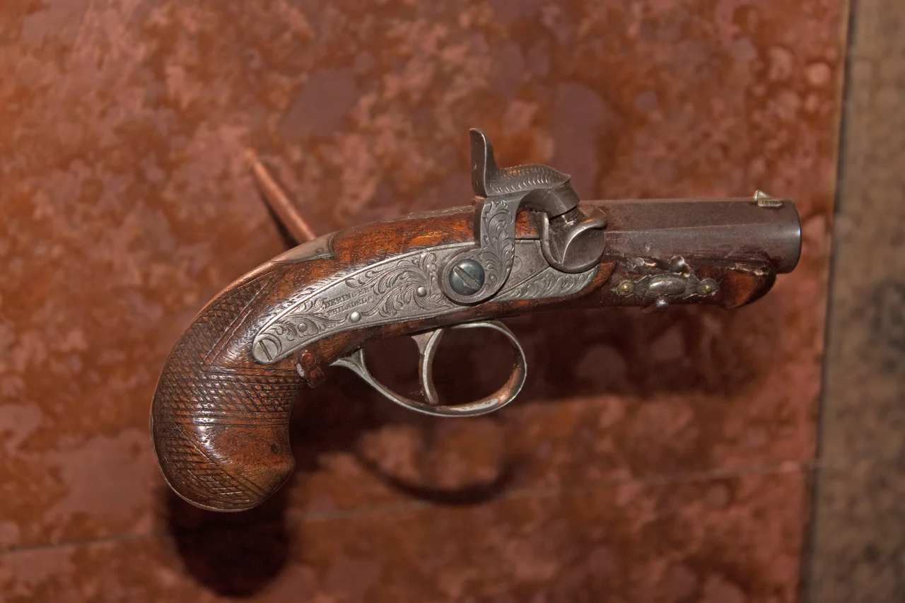 The Gun used to assassinate Abraham Lincoln on display at Ford's Theatre in Washington, D.C.
