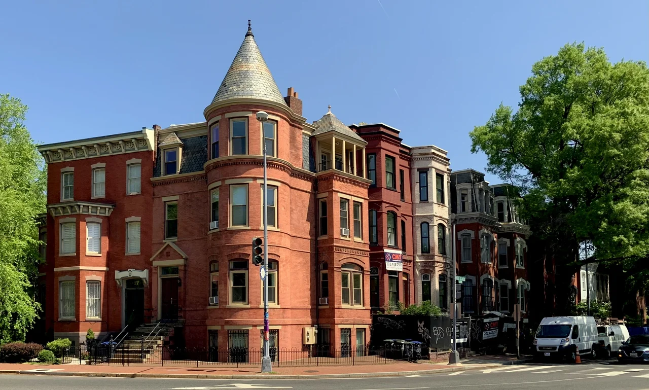 From right to left: 1205 and 1207 Rhode Island Avenue NW were built in 1878 for George W. Spears. 1209 and 1211 Rhode Island Avenue NW were built in 1878 for A.C. Jennings. 1213 and 1215 Rhode Island Avenue NW, built in 1887 and designed by architect George B. Phelps, were also built for Spears. The corner house, 18 Logan Circle NW, was also designed by Phelps and built at the same time for Spears. It is the previous home of author and journalist Ambrose Bierce. 17 Logan Circle NW was built sometime around 1878. All of the buildings are contributing properties to the Logan Circle Historic District and Greater Fourteenth Street Historic District.