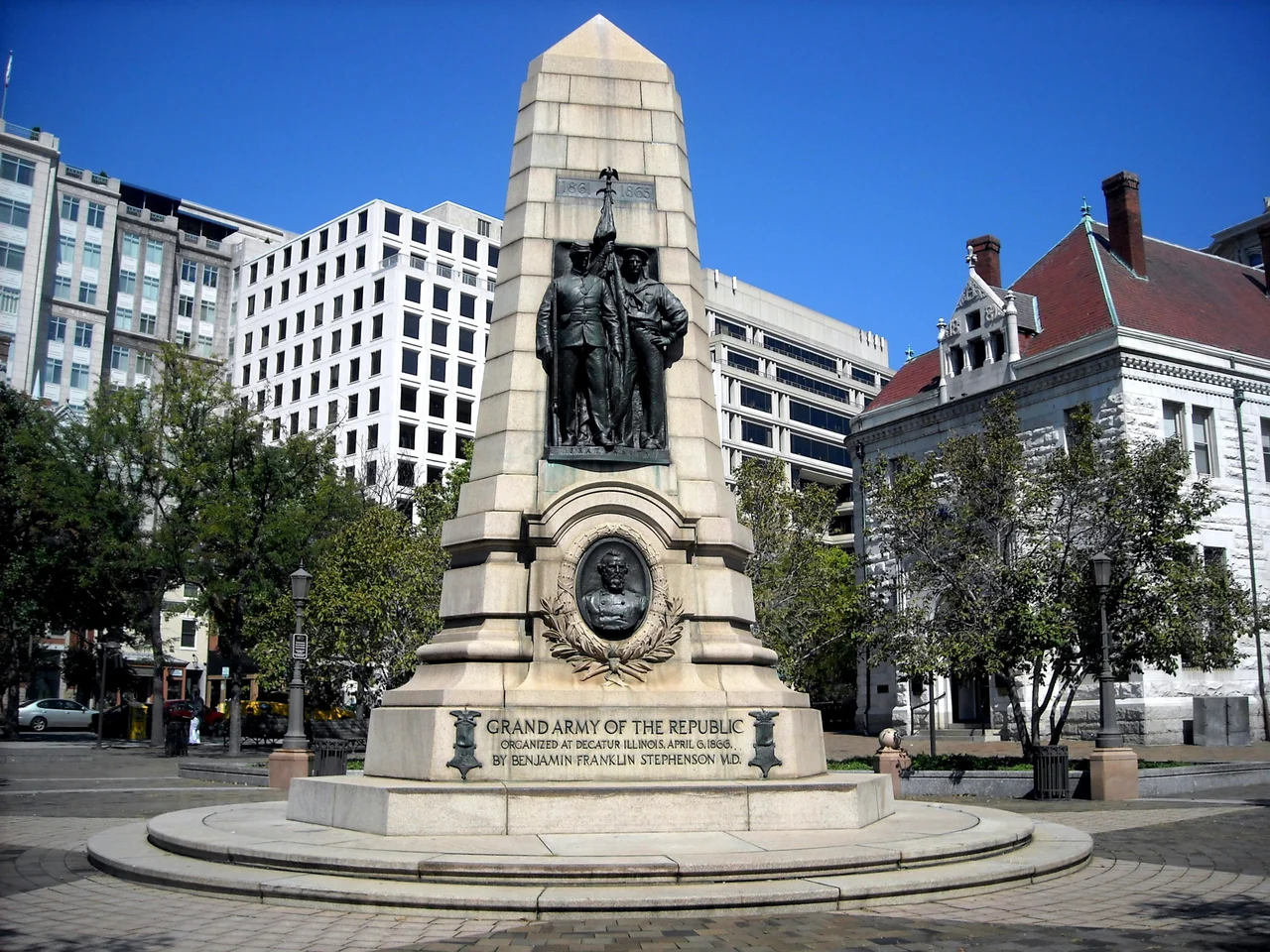 The Grand Army of the Republic Memorial (G.A.R. Memorial), also known as the Dr. Benjamin F. Stephenson Memorial, located at the intersection of 7th Street, C Street, and Pennsylvania Avenue, N.W., in the Penn Quarter neighborhood of Washington, D.C. The former National Bank of Washington is visible on the right-hand side.
Sculpted by John Massey Rhind, and dedicated on July 3, 1909, the bronze sculpture honors Benjamin F. Stephenson, M.D., founder of the Grand Army of the Republic (G.A.R.).
The G.A.R. Memorial is one of seventeen Civil War monuments in Washington, D.C., that were collectively listed on the National Register of Historic Places (NRHP) on September 20, 1978. In addition, the G.A.R. Memorial is designated as a contributing property to the Pennsylvania Avenue National Historic Site, listed on the NRHP on October 15, 1966, and the Downtown Historic District, listed on the NRHP on September 22, 2001.