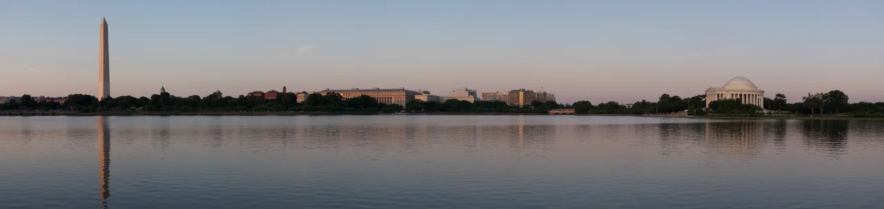 This is a panorama looking across the Tidal Basin in Washington, D.C.. The Washington Monument can be seen to the left and the Jefferson Memorial to the right.