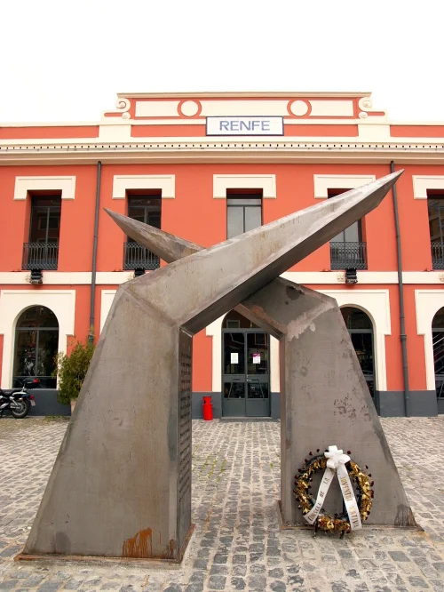 Aixopluc war memorial placed in front of Xàtiva's RENFE station, dedicated on February 18th, 2007 (just a few days earlier, hence the flowers)
