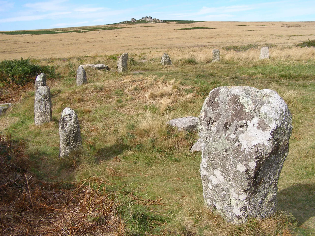 Tregeseal East stone circle with Carn Kenidjack in the distance, near St Just in Penwith, Cornwall