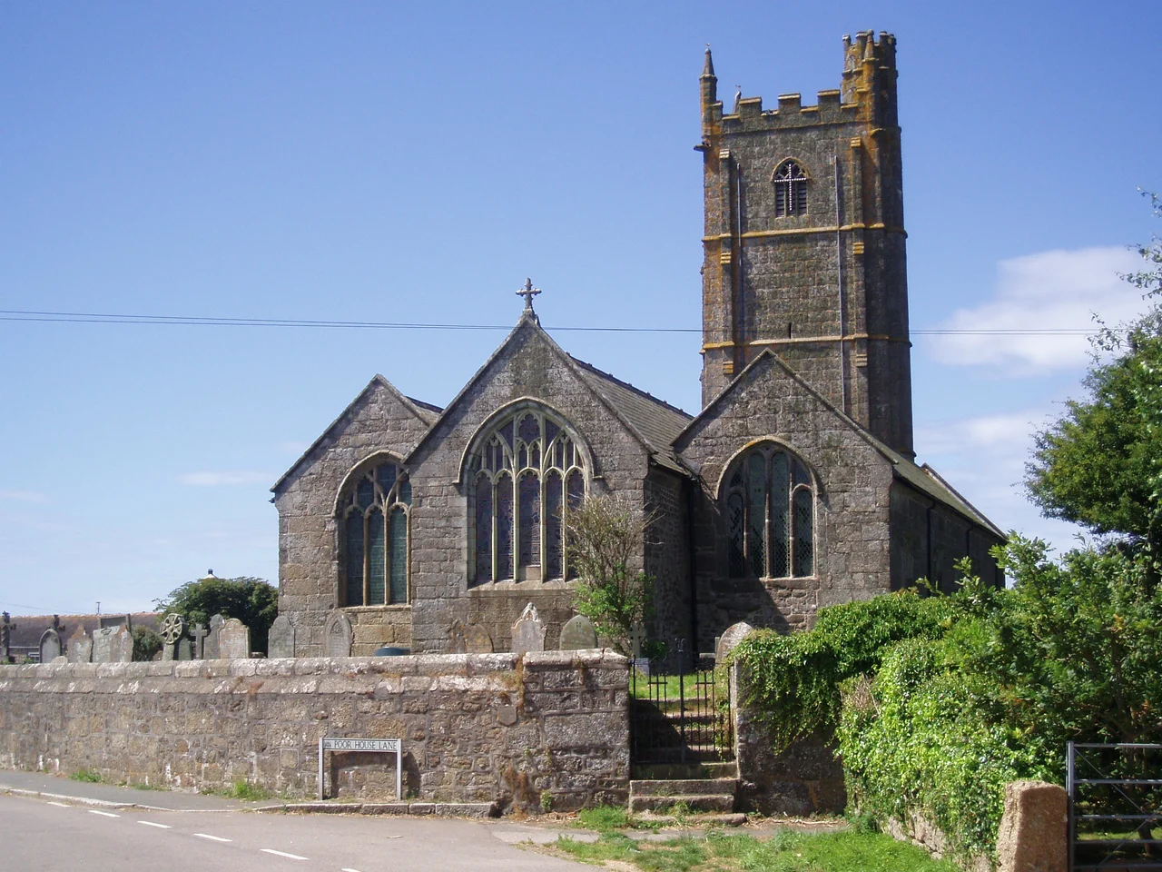 The church of St Buryan from behind, showing the stain glass windows. The church is dedicated to Saint Buriana.