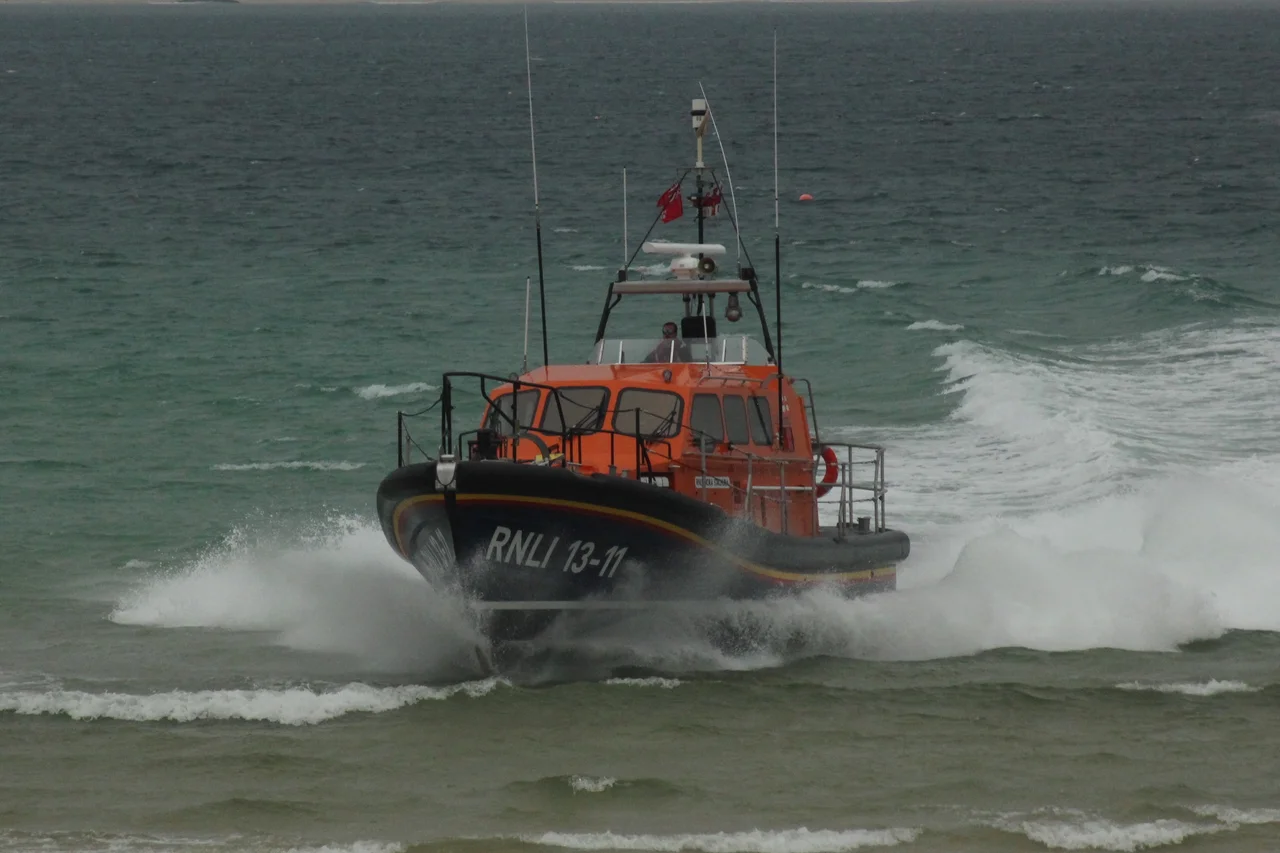 The St Ives lifeboat Nora Strachura at sea outside St Ives harbour.