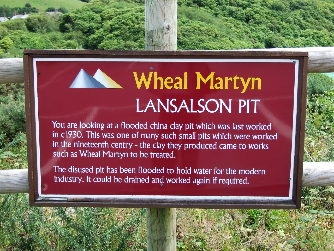 Preserved buildings of the Wheal Martyn clay works, part of the museum in Cornwall, England. On the right are the open-air settling tanks; the adjacent long building is the pan kiln, or "dry".