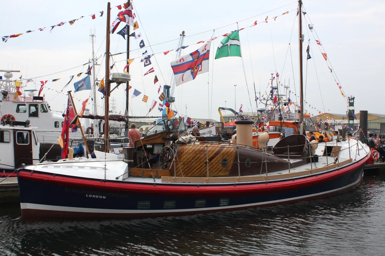 The former Salcombe Watson-class lifeboat Samuel and Marie Parkhouse (RNLI Official Number 805) at the Poole Lifeboat Festival in 2024. It is now privately owned and named Orinos.