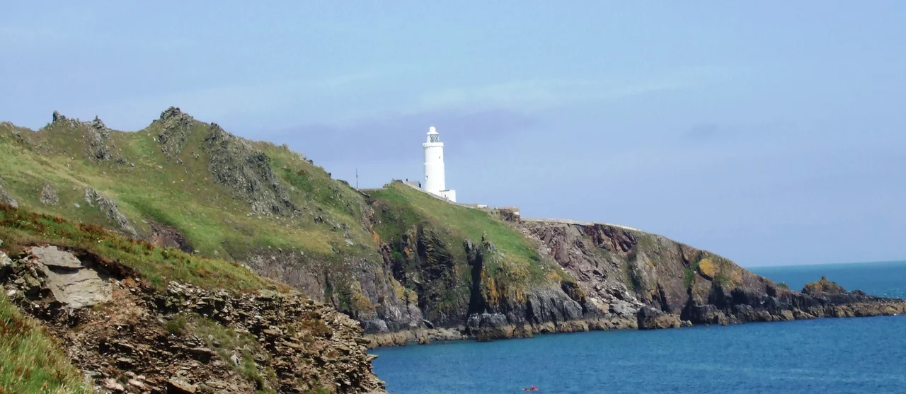 Start Point lighthouse taken from the South West Coast Path from the west