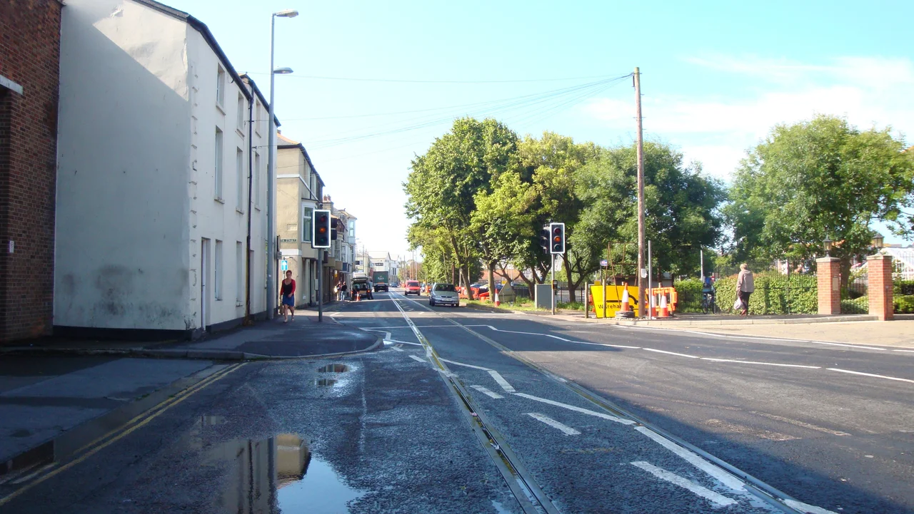 Looking south down Commercial Road at the disused former Weymouth Harbour Tramway which until 1987 took boat trains to the harbour station. Last used in 1999, it is mothballed.