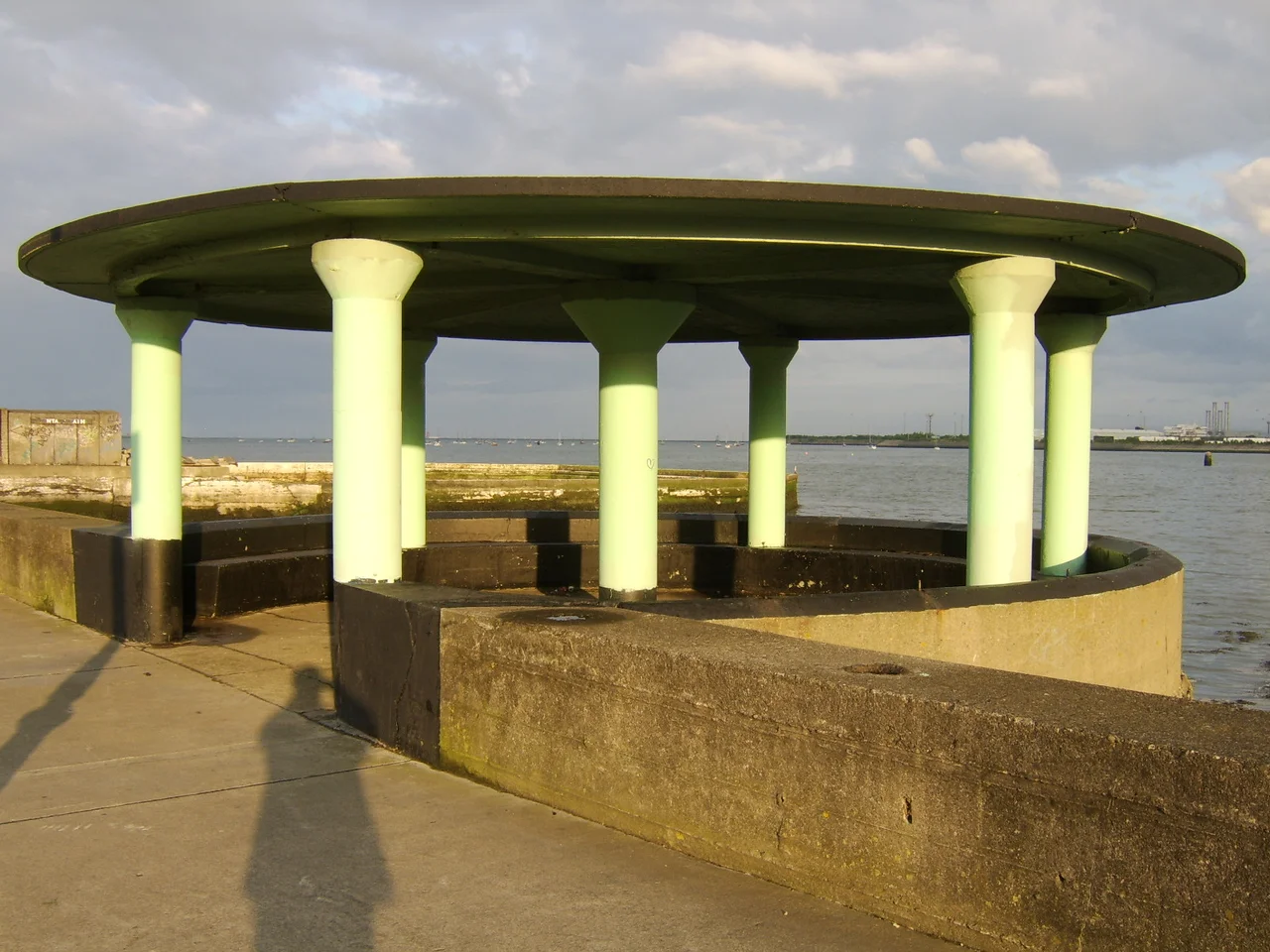 This is a public rain shelter projecting out from the promenade in Clontarf, one of the northern suburbs of Dublin, near Bull Island and the Tolka Estuary. It was built over a former mineshaft.