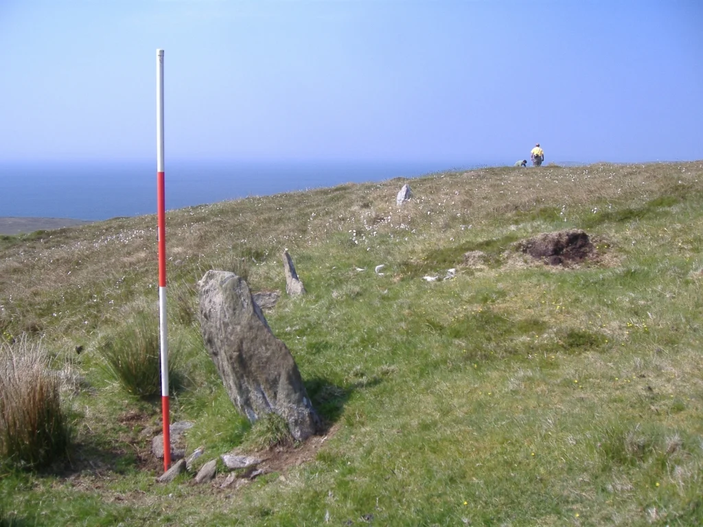 A series of ancient markers from prehistoric times which encircle this mountain in Kilcommon, Erris, North Mayo - lead from one set of megalithic monuments (Graghil) to another (Faulagh/Muingerroon complex) on mountains approx 5 miles away.