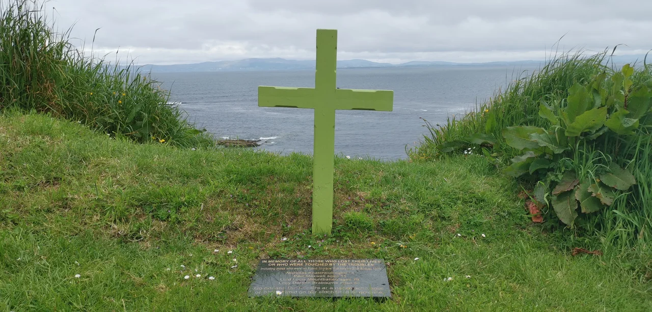 Cliffs near Mullaghmore near Mullaghmore at Mullaghmore Peninsula in the SAC Bunduff Lough and Machair/Trawalua/Mullaghmore; memorial to the Shadow V
Inscription reads:
IN MEMORY OF ALL THOSE WHO LOST THEIR LIVES OR WHO WERE TOUCHED BY THE TROUBLES
including those who were on board Shadow V at sea on 27th August 1979
Nicholas Knatchbull aged 14
Paul Maxwell aged 15
Lord Louis Mountbatten aged 79
Lady Doreen Brabourne aged 83
Go ndéana Dia trócaire ar a nanamacha agus go bhfaighimíd go léir síocháin in ár gcroithe
(May God have mercy on their souls and may we all find peace in our hearts)