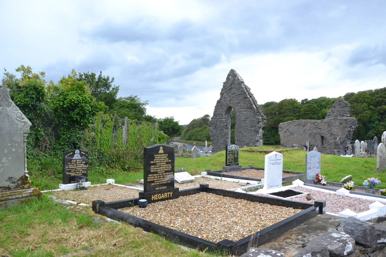 Donegal, County Donegal, Ireland
South-east view of Donegal Friary with the Main Channel of Donegal Bay leading to Donegal harbour in the background. At the left the surviving south window of the south transept is to be seen, in the center the north wall of the nave, and at the right the walls of the choir including the ruins of the east window.