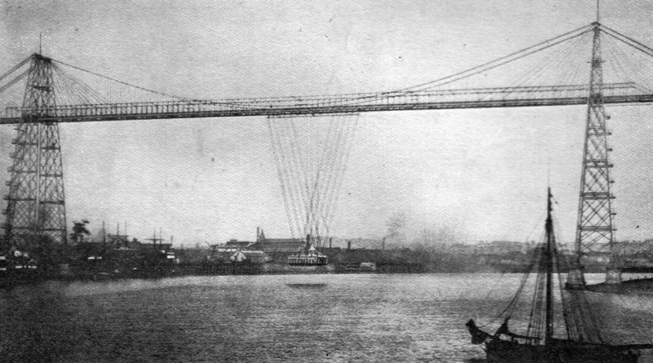 Transporter Bridge, Newport (Monmouth)
Crosses the River Usk and has a clear span between the towers of 592 feet and a height above high water level of 180 feet.
Photo: Valentine & Sons, Ltd.
Newport transporter bridge