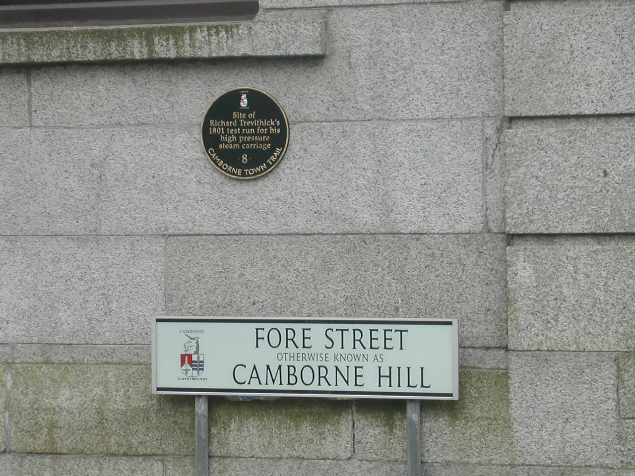 Fore Street, Camborne, Cornwall, United Kingdom, also known as 'Camborne Hill', along which en:Richard Trevithick was the first to demonstrate automotive (high pressure steam) power on Christmas Eve, 1801. Street name and plaque.
Author Chris Angove

June 2006