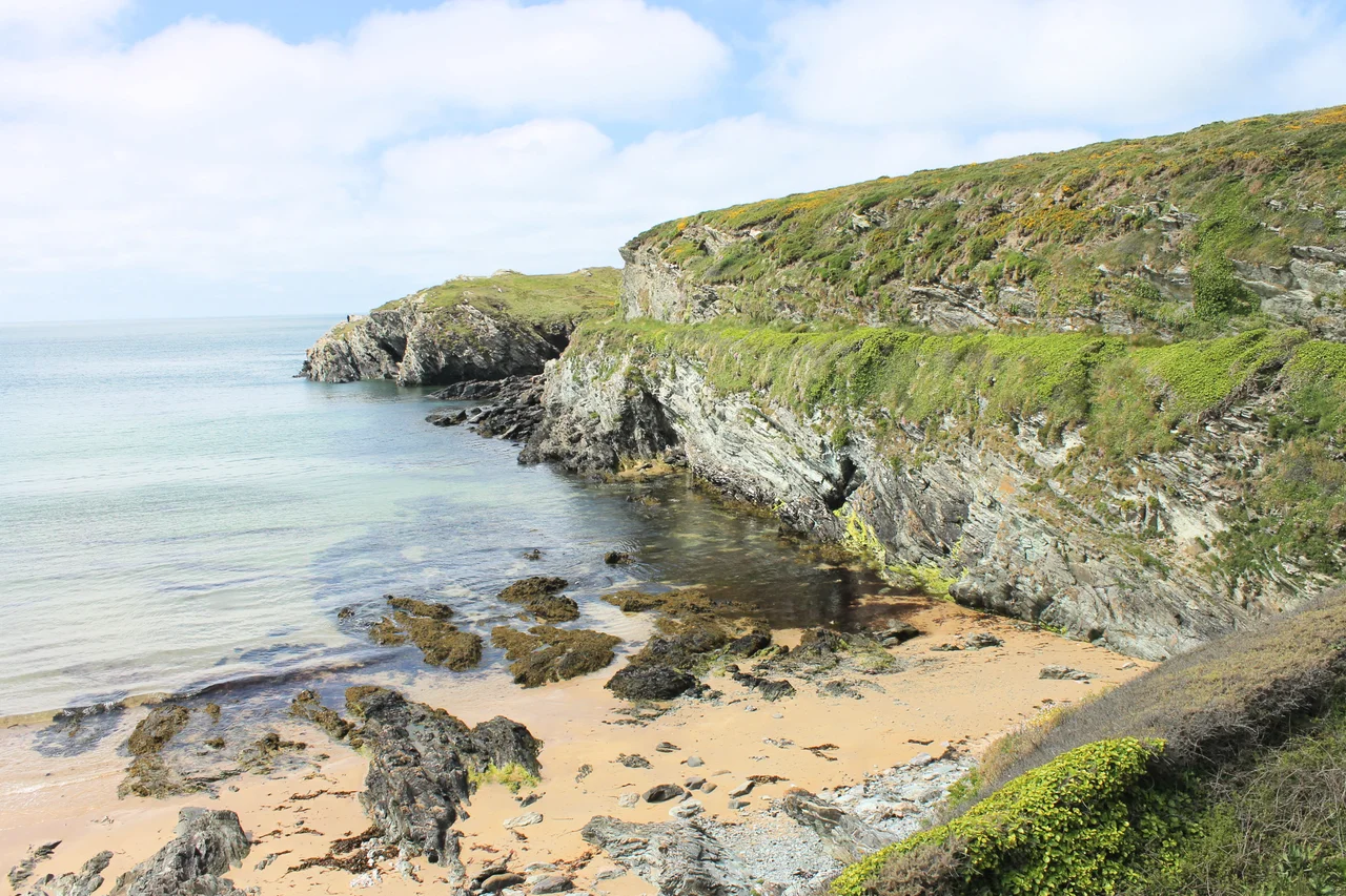 Porth Dafarch is a small bay on the west coast of Ynys Mon in Wales. It lies on the west side of Holy Island, Anglesey about 2 mi (3.2 km) southwest of Caergybi and 1.5 mi (2.4 km) northwest of Bae Trearddur.