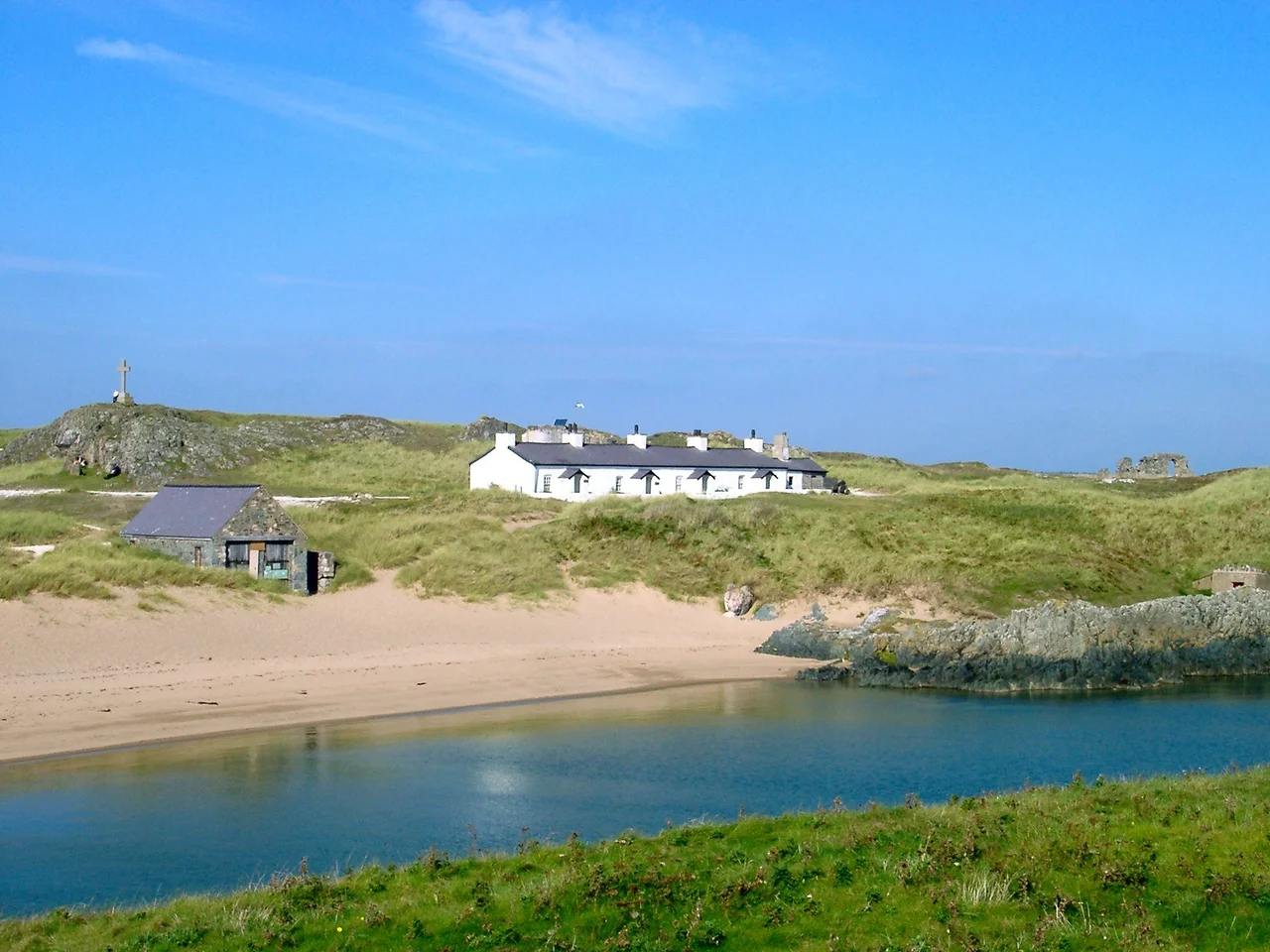 Pilots cottages on Llanddwyn. The pilots also manned the lifeboat station which was later run by the RNLI. A small light was established in 1823 by the Caernarfon Harbour Trustees as a navigational aid for entering the Menai Straits and Caernarfon harbour