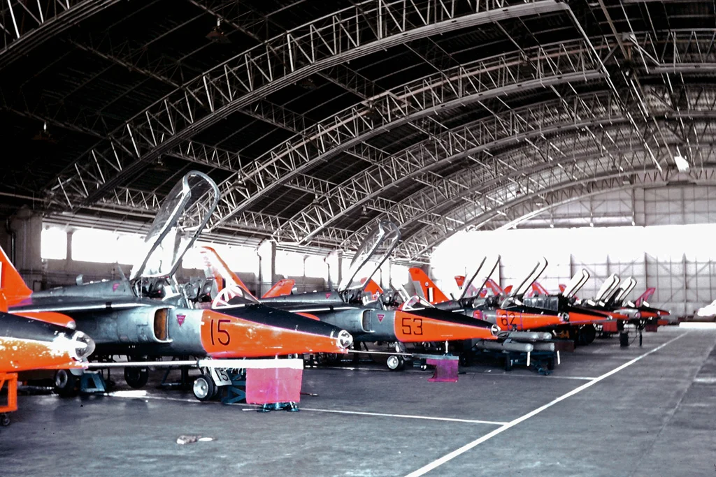The maintenance hangar at RAF Valley in 1967 with Folland/HS Gnat T.1's receiving servicing.