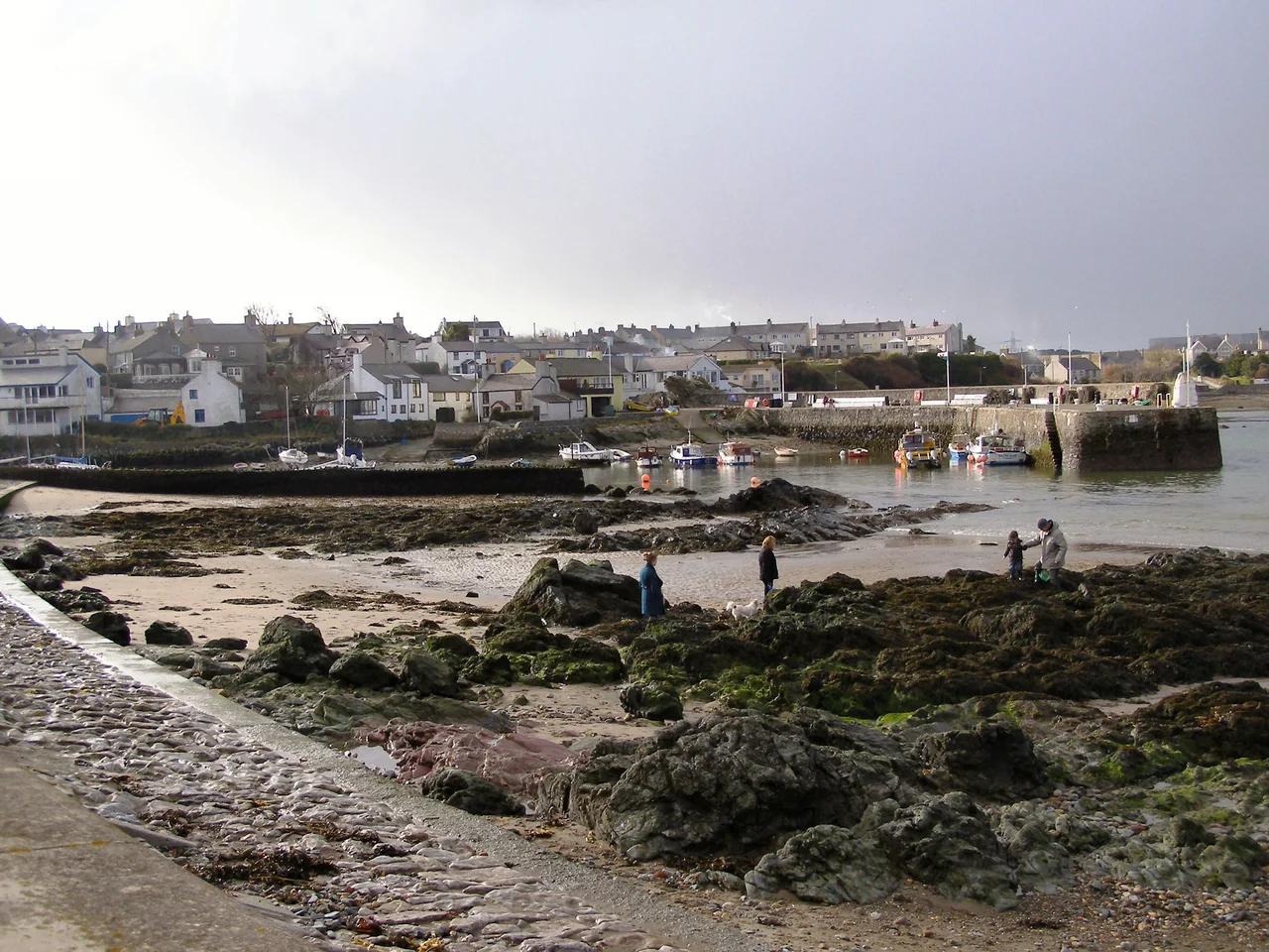 Cemaes Looking across the beach and harbour towards the town.